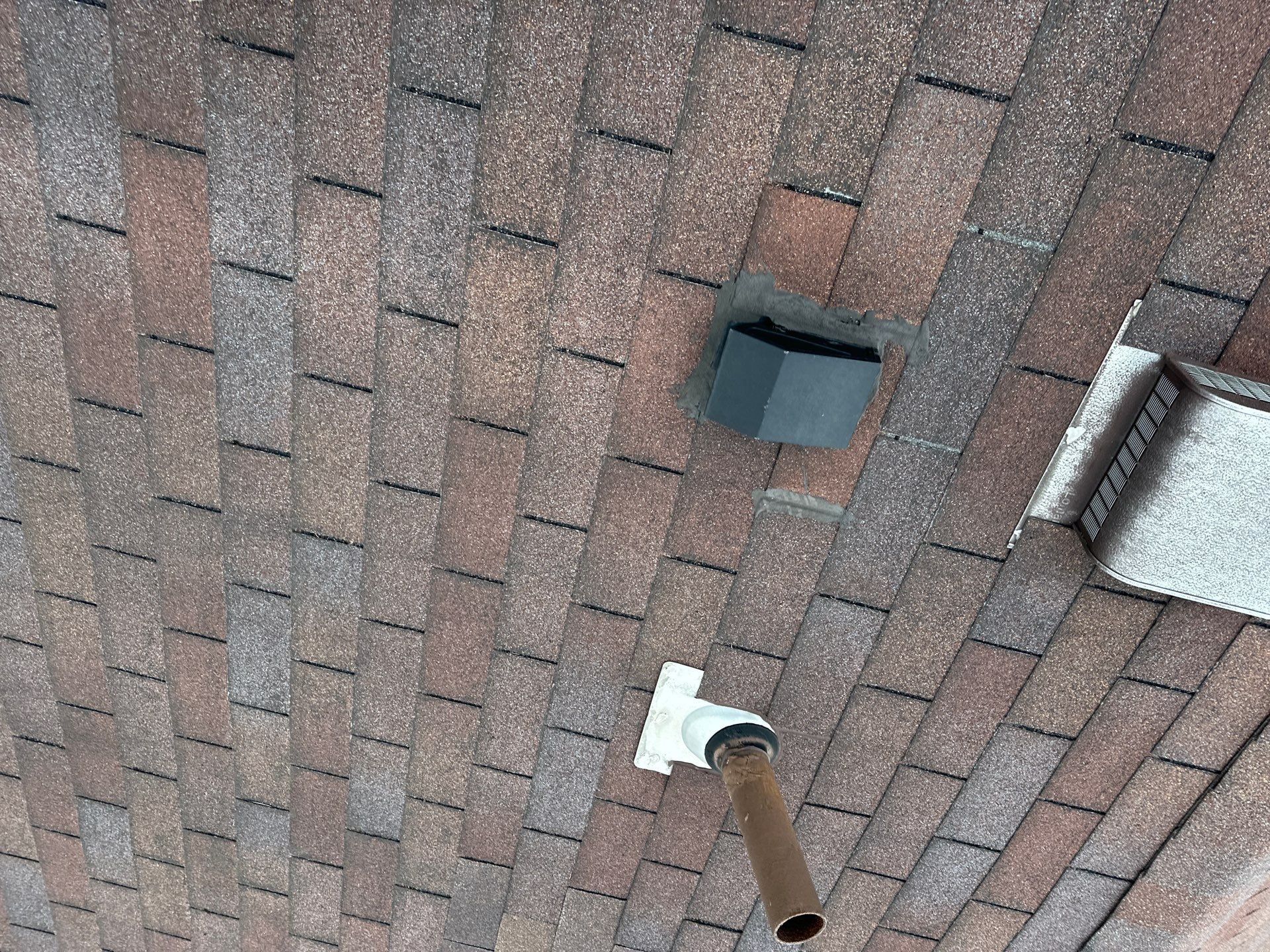 Roof vents and a vent pipe on the old shingles, Beavercreek, Ohio.