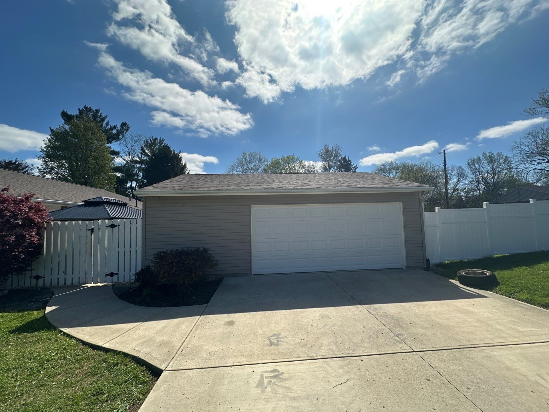 Detached garage at the end of the drive