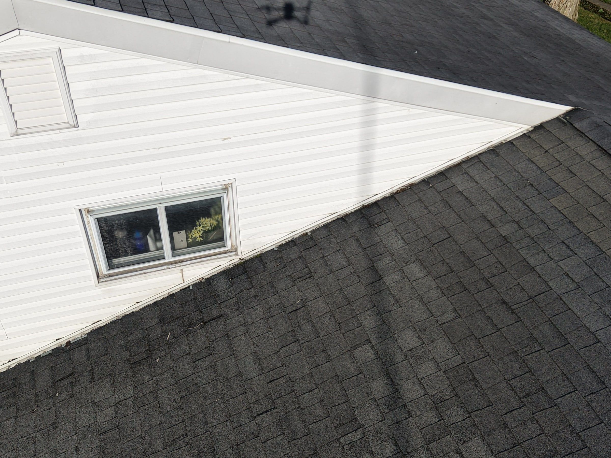 Upper wall meeting the shingle plane
