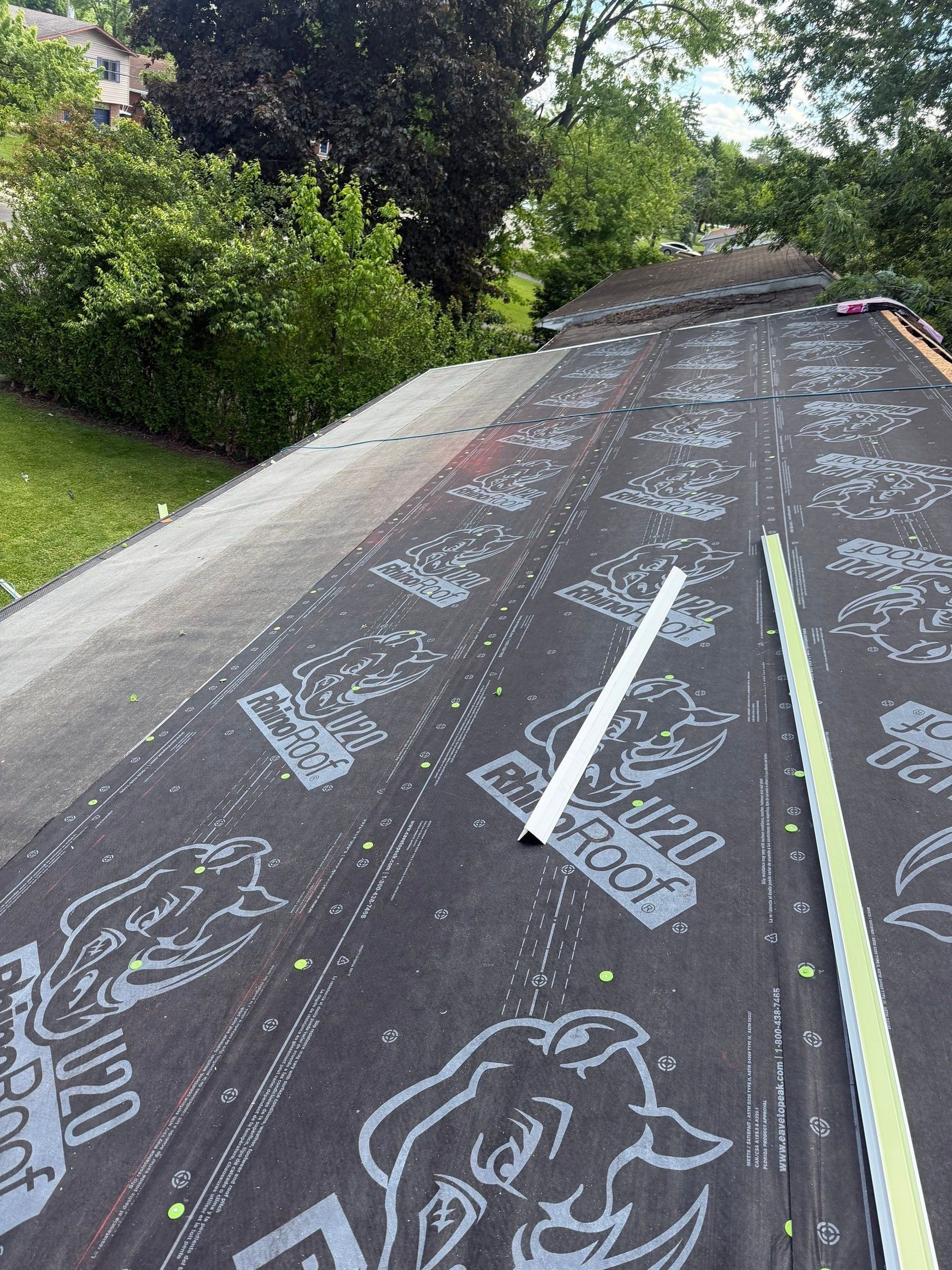 Synthetic underlayment over the ridge and the ice and water shield below it, Dayton, Ohio.