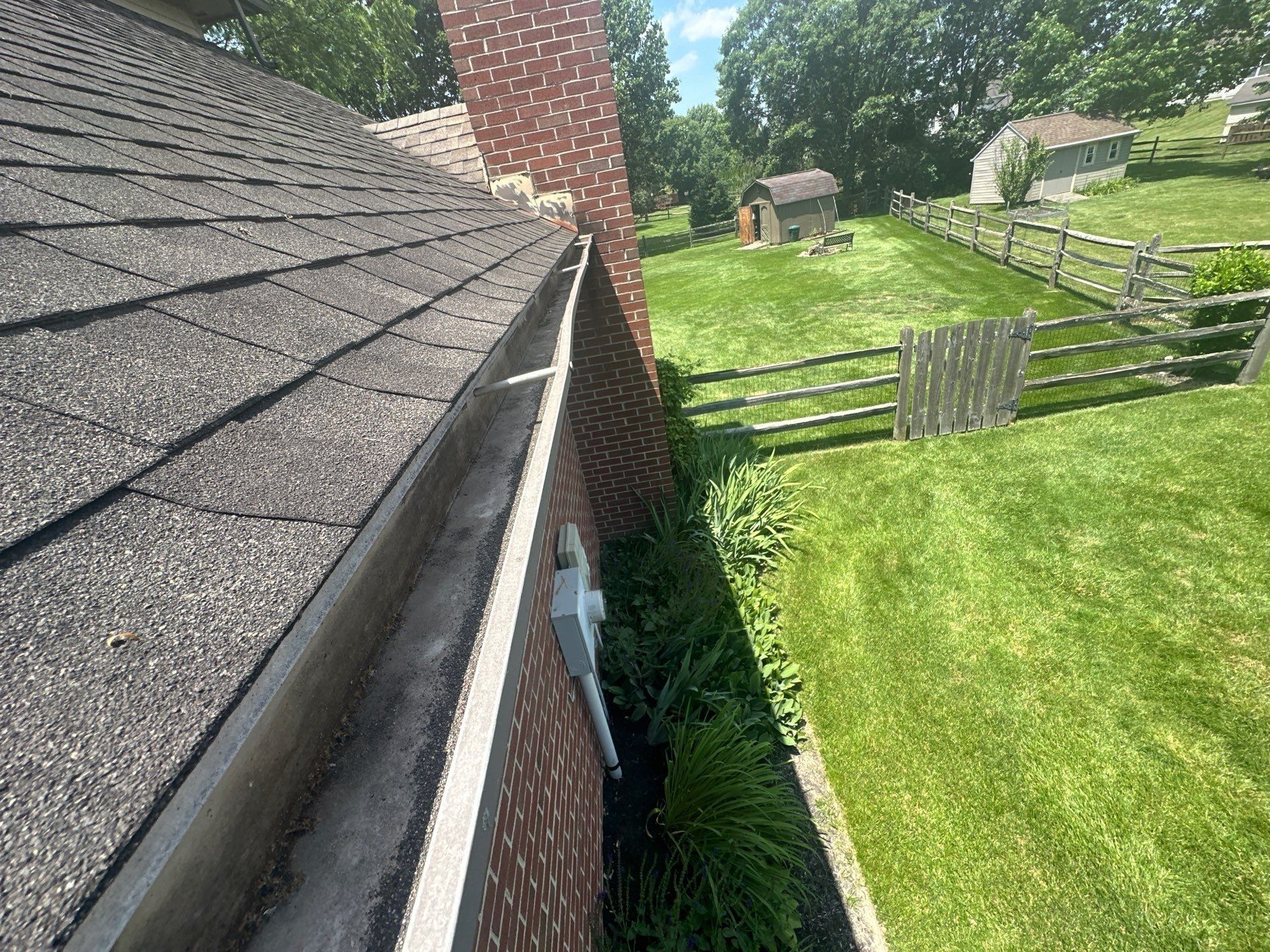 Gutter run and debris in the trough