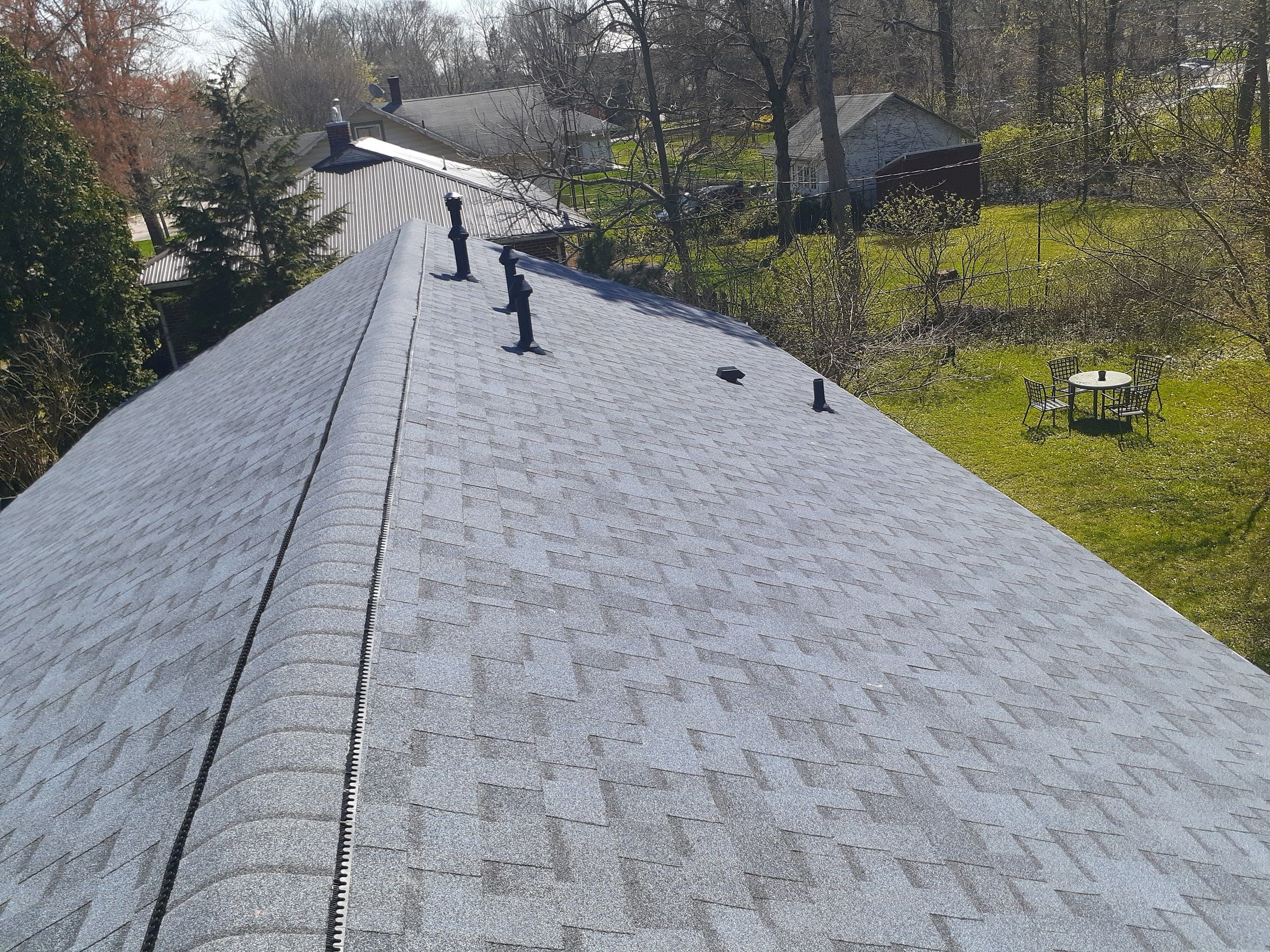 The finished roof along the ridge, looking toward the back yard and patio table, Yellow Springs, Ohio.