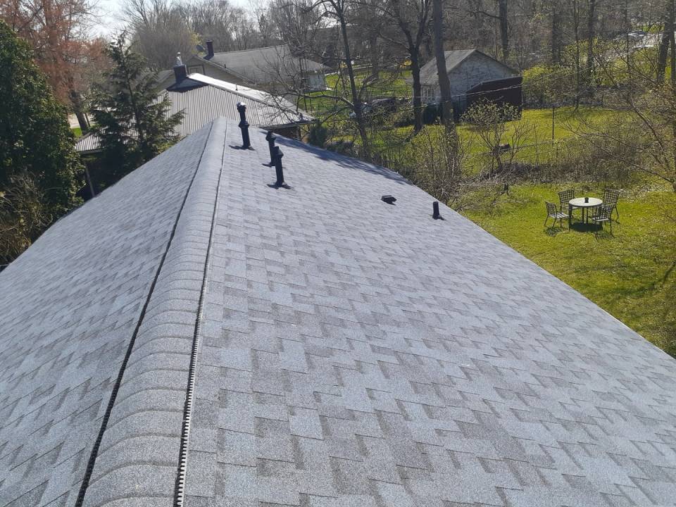 The finished roof along the ridge, looking toward the back yard and patio table, Yellow Springs, Ohio.