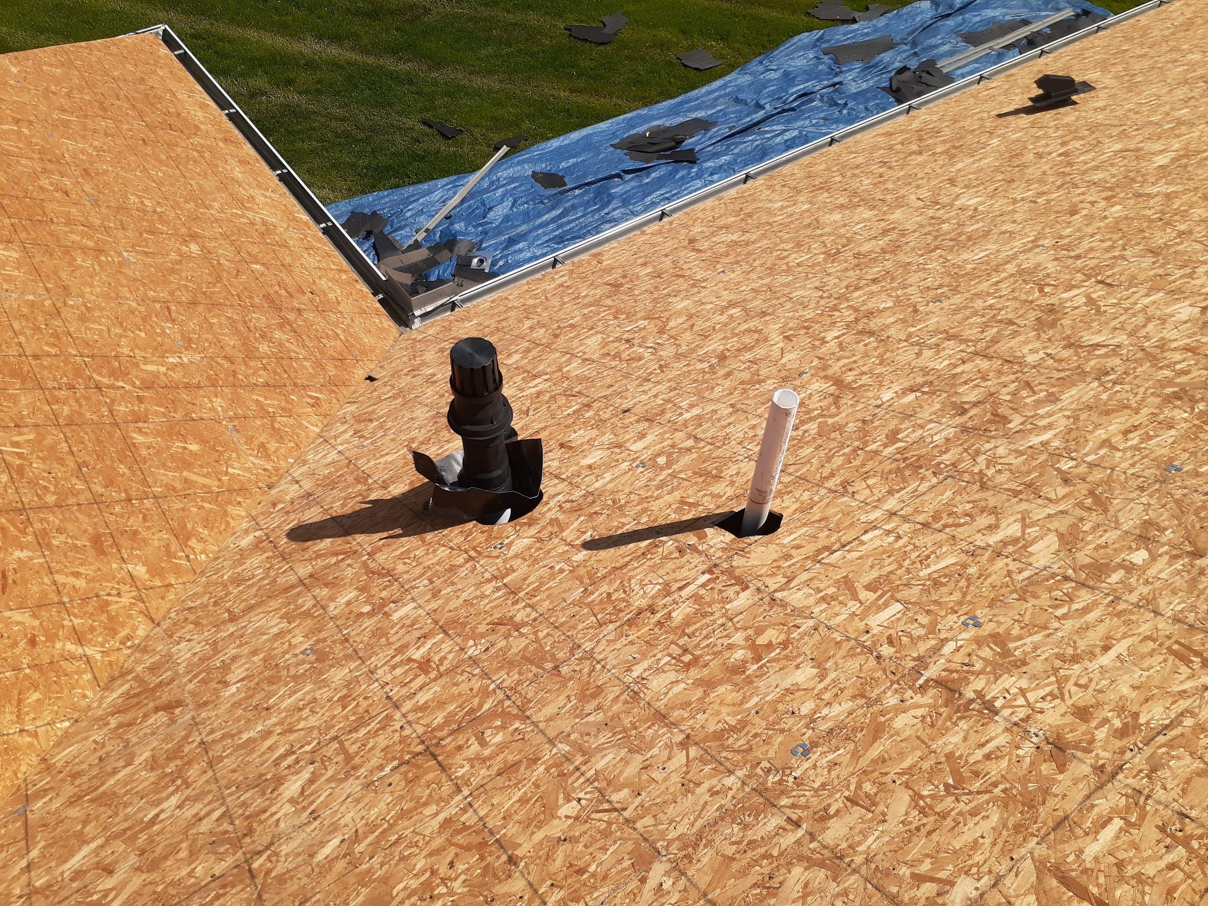 New sheathing, vent boot and flue