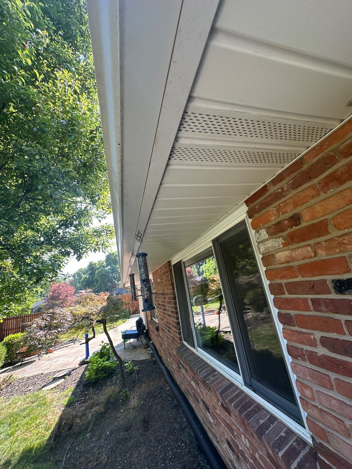 A short perforated soffit section above a window, Kettering, Ohio.