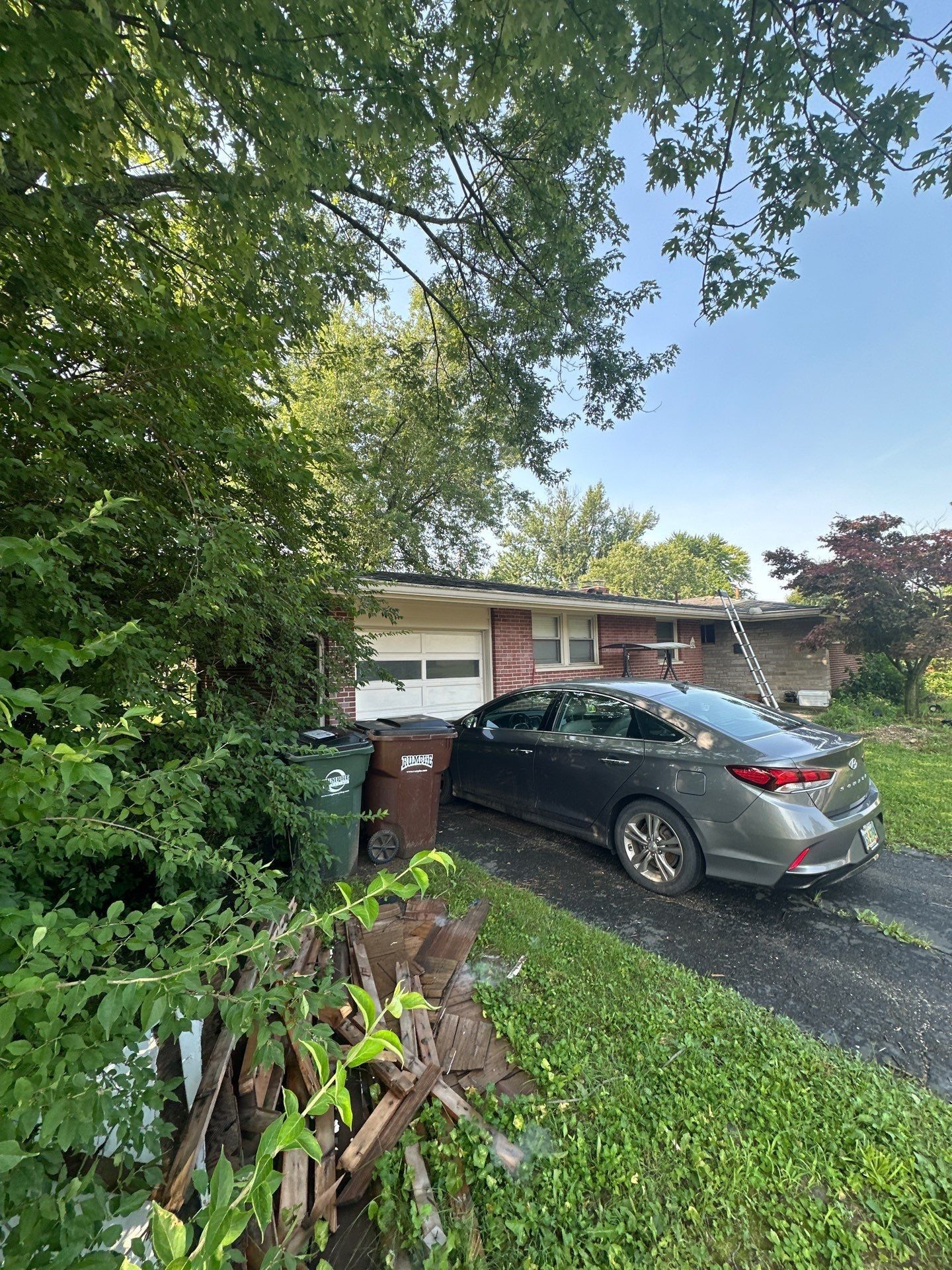 The driveway side of the house and the garage, Kettering, Ohio.