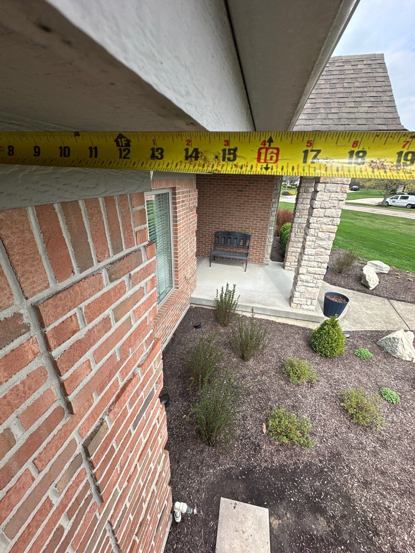 Tape along the brick at the eave