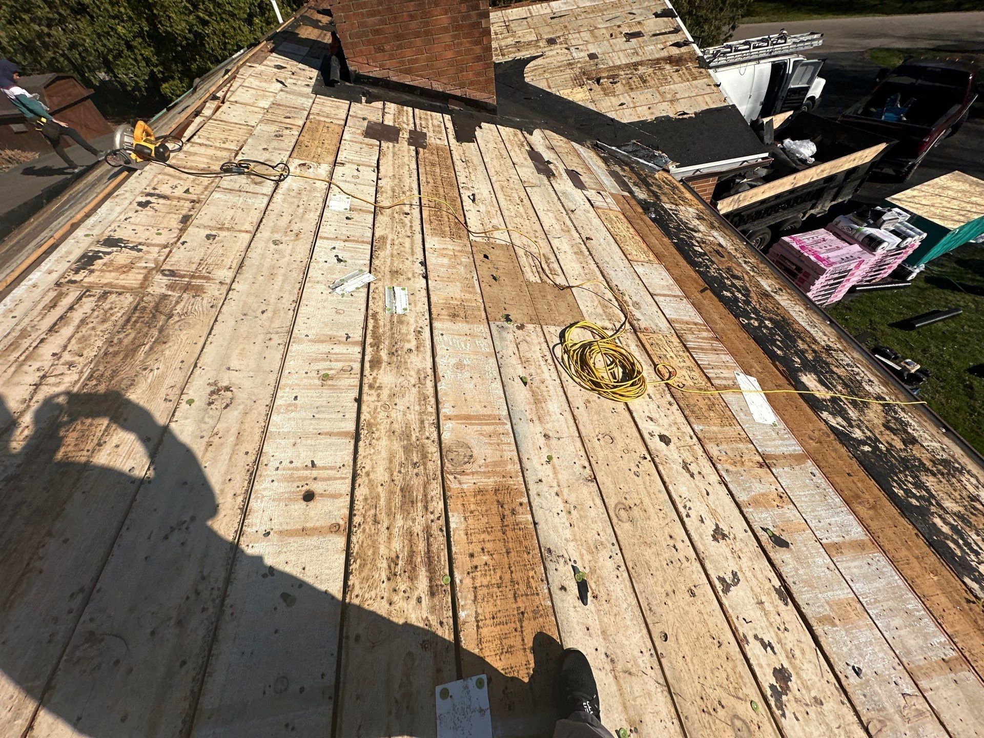 Bare plank decking, cord and saw