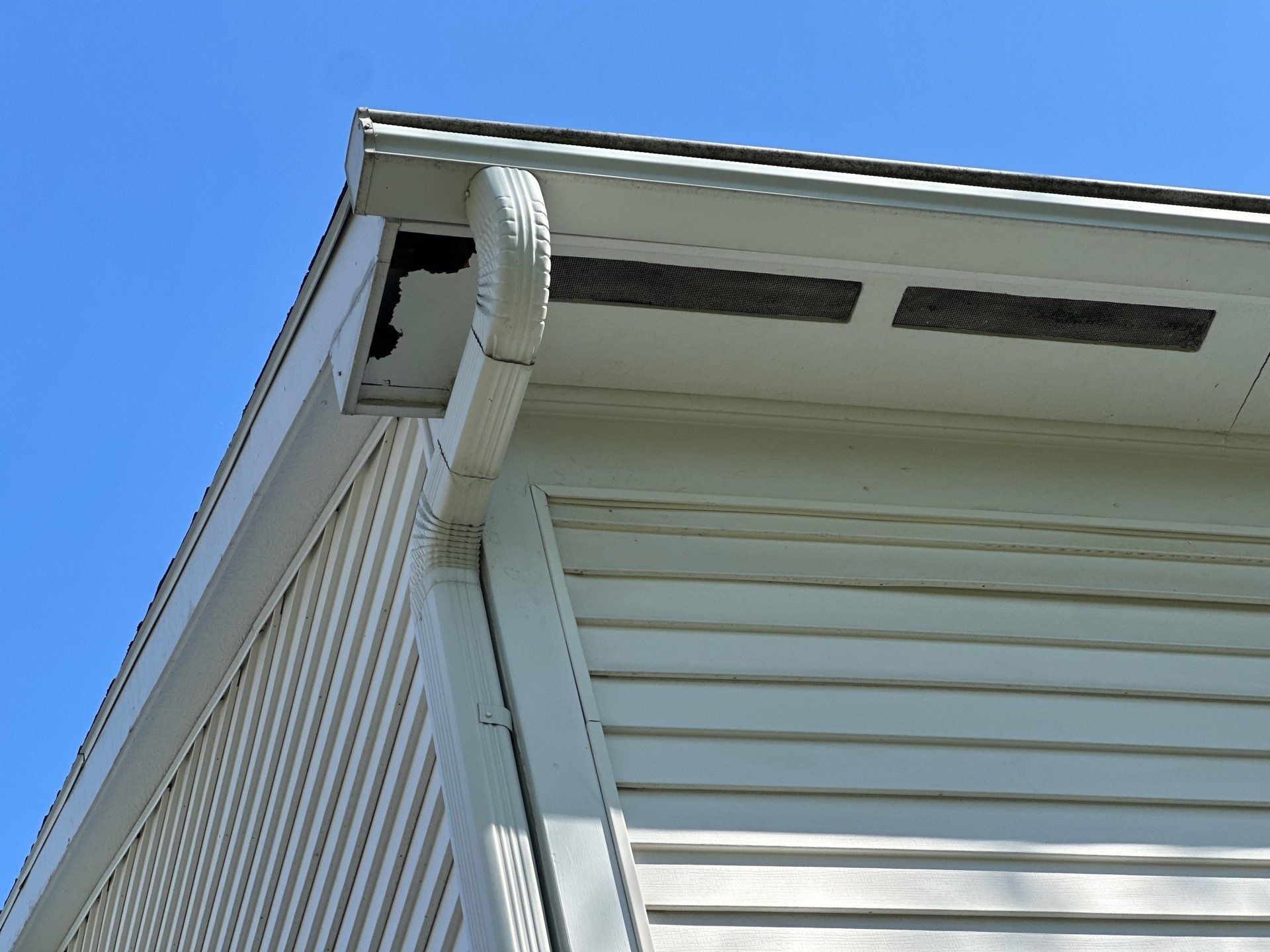 Eave corner, vent panels and boxed return