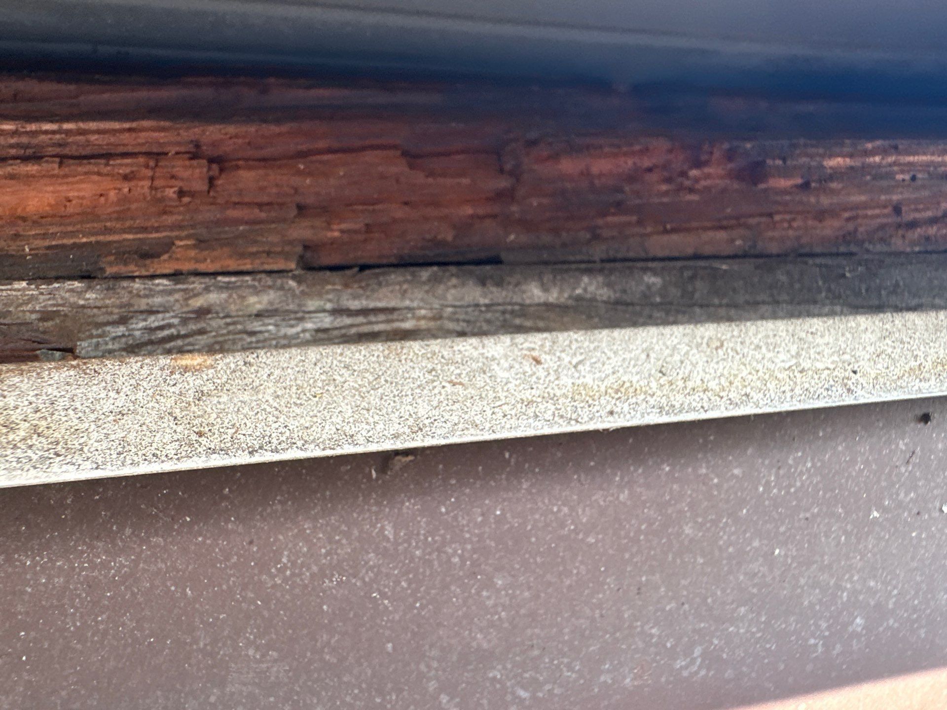 The roof sheathing at the edge, behind the drip edge, Kettering, Ohio.