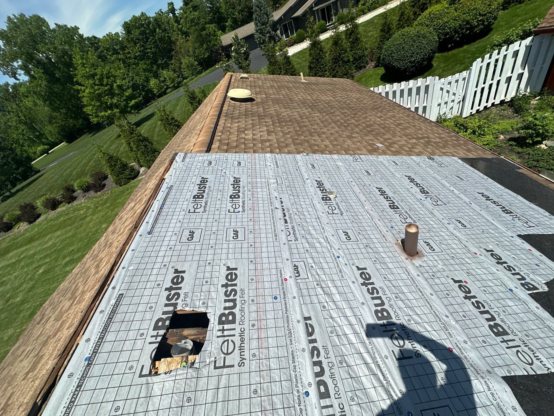 Synthetic underlayment across the main roof