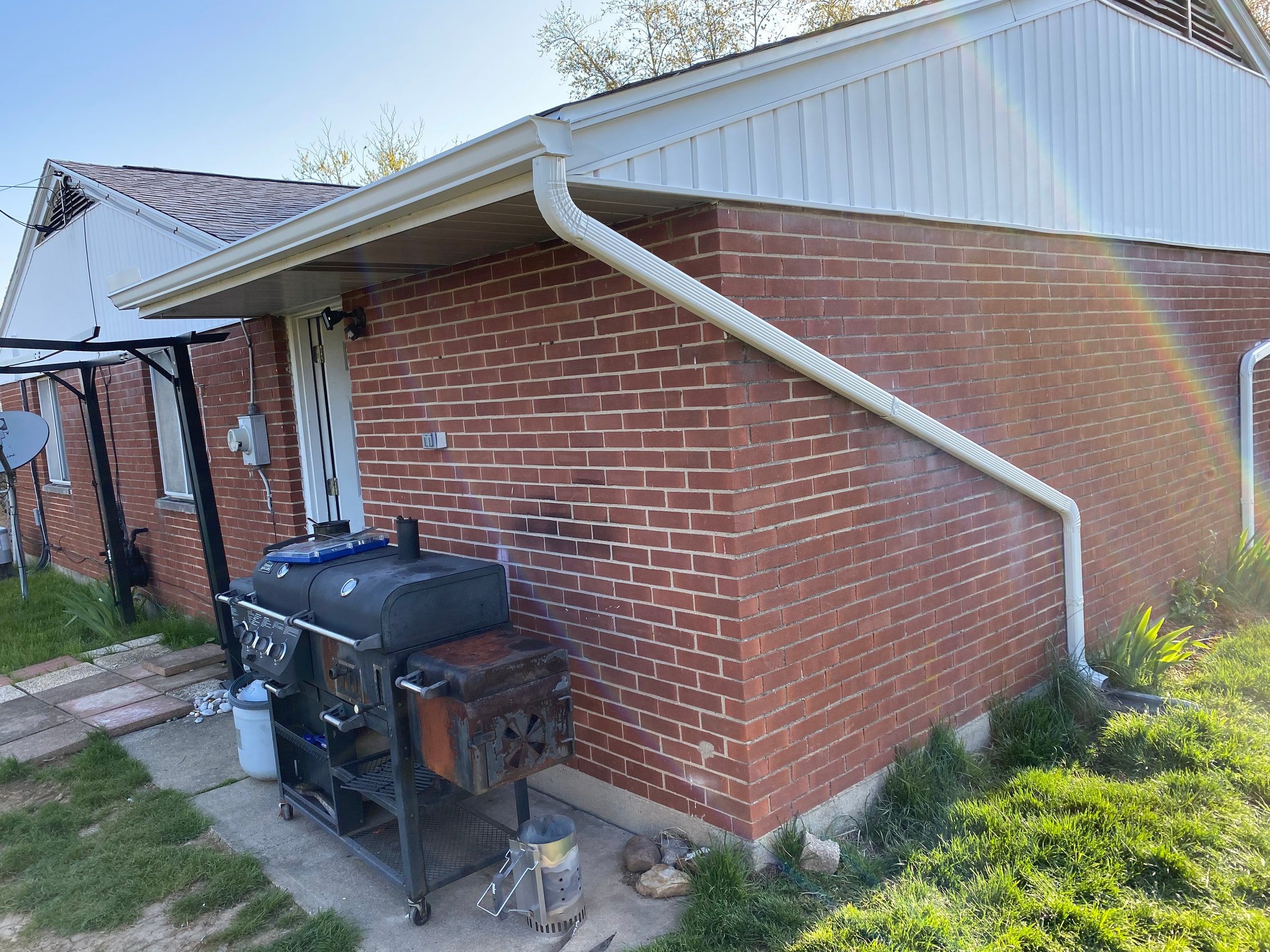 The corner of the house under the new roof, by the patio, Kettering, Ohio.
