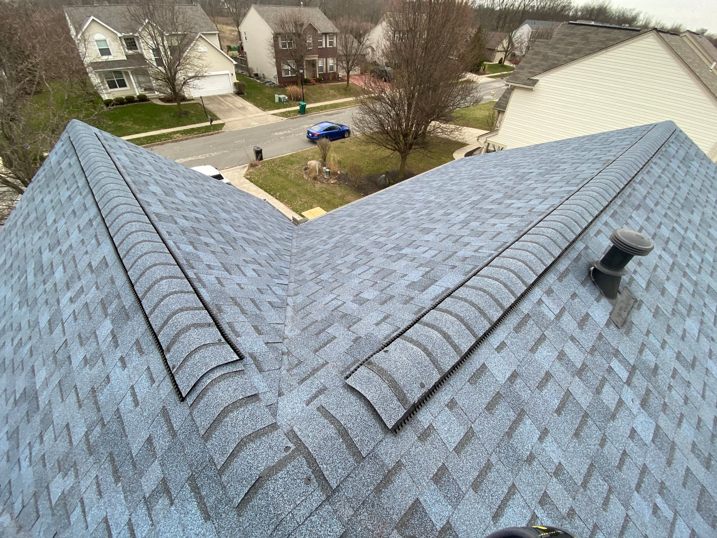Capped ridges and a vent stack boot