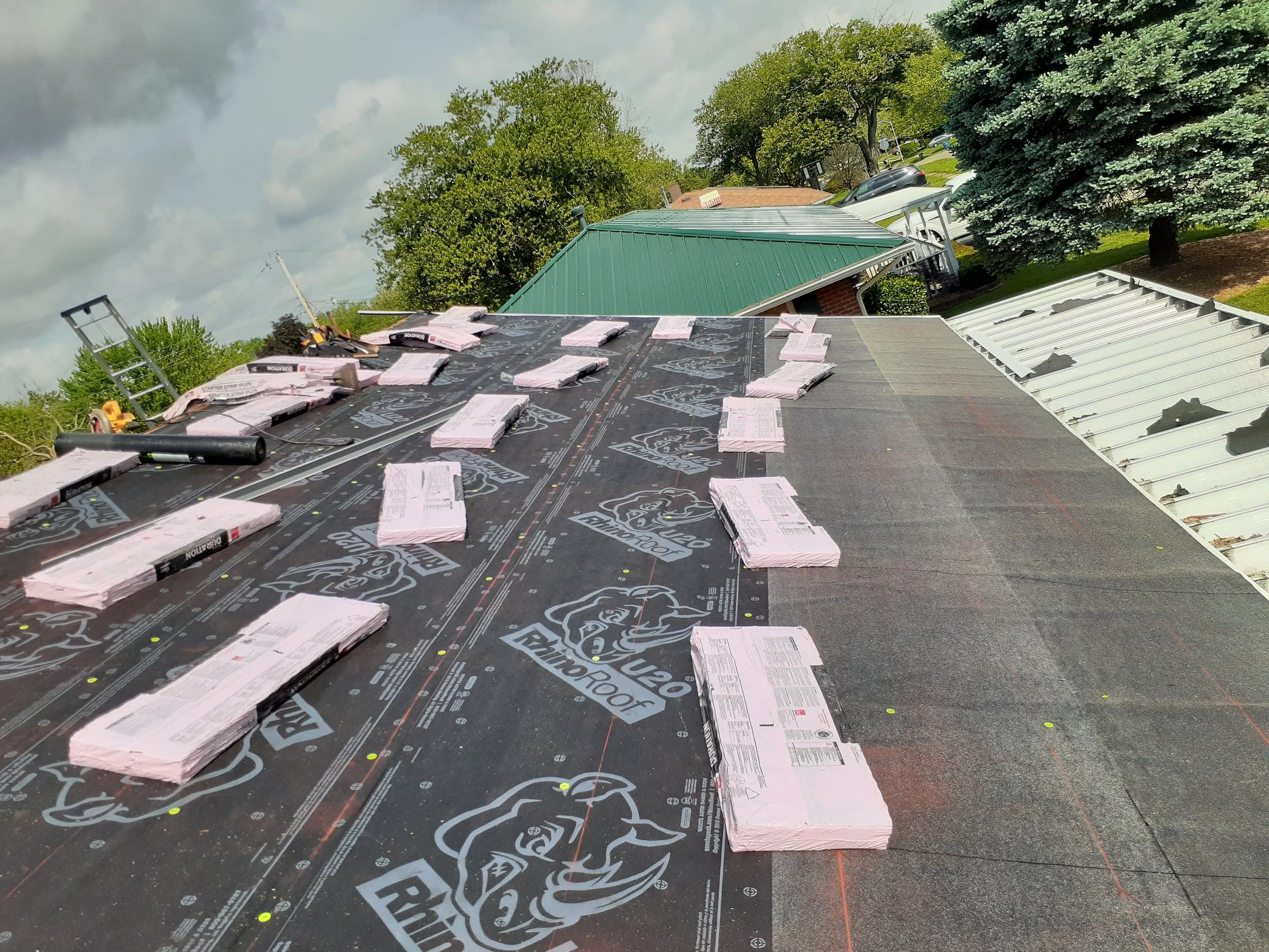 Owens Corning Duration bundles staged across the underlayment, Huber Heights, Ohio.