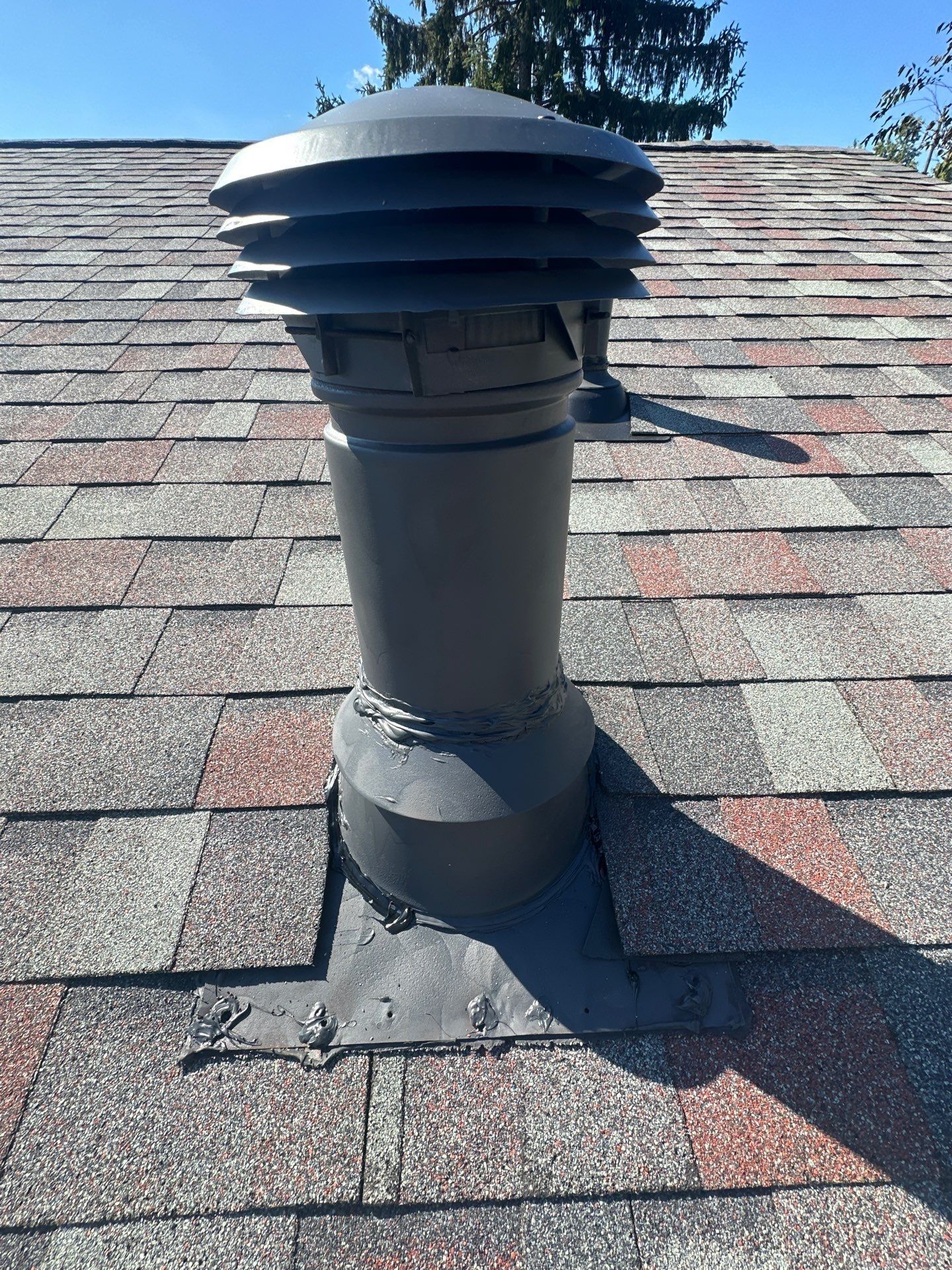A new vent stack with a fresh base on the finished roof, West Carrollton, Ohio.