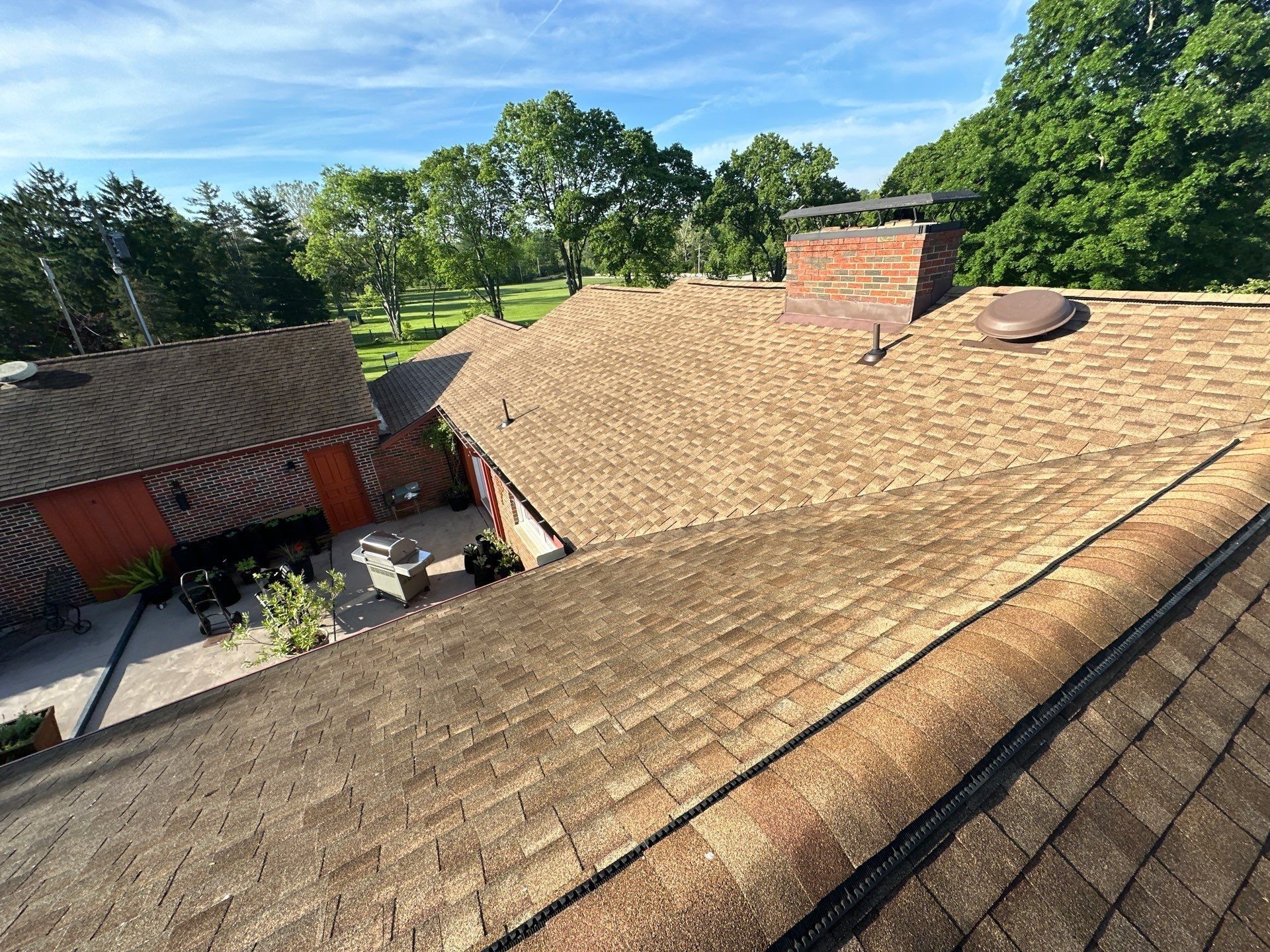 The repaired back slope above the patio, with the chimney beyond, Clayton, Ohio.
