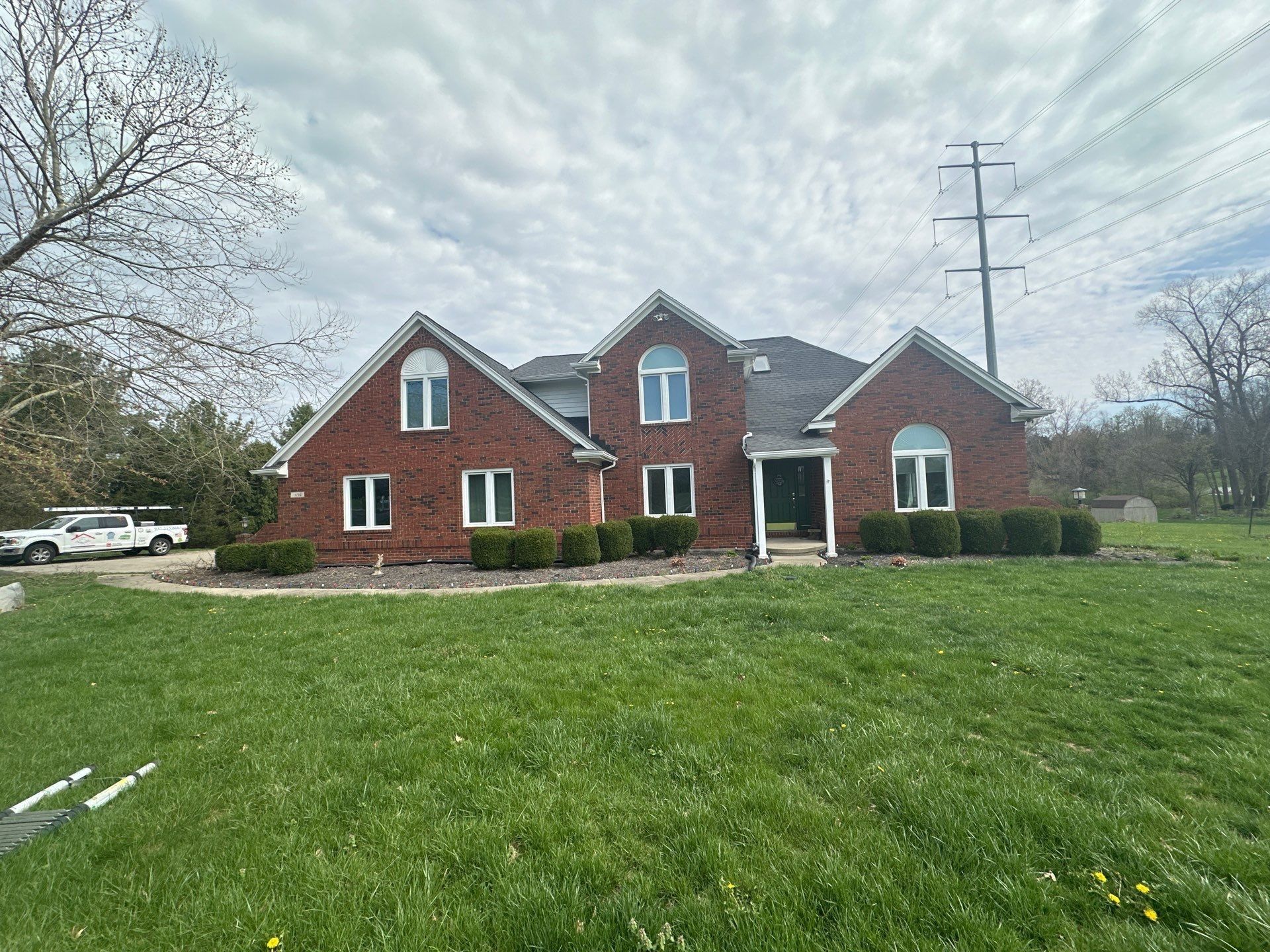 The two-story brick house from the front lawn, Xenia, Ohio.