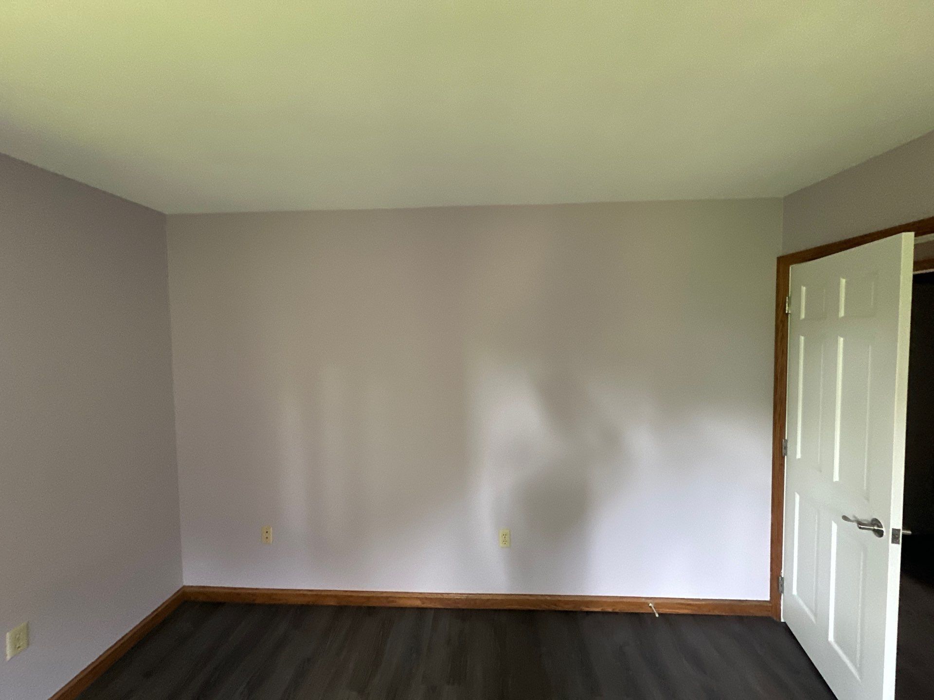 A freshly painted wall and ceiling in a repaired room, Beavercreek, Ohio.