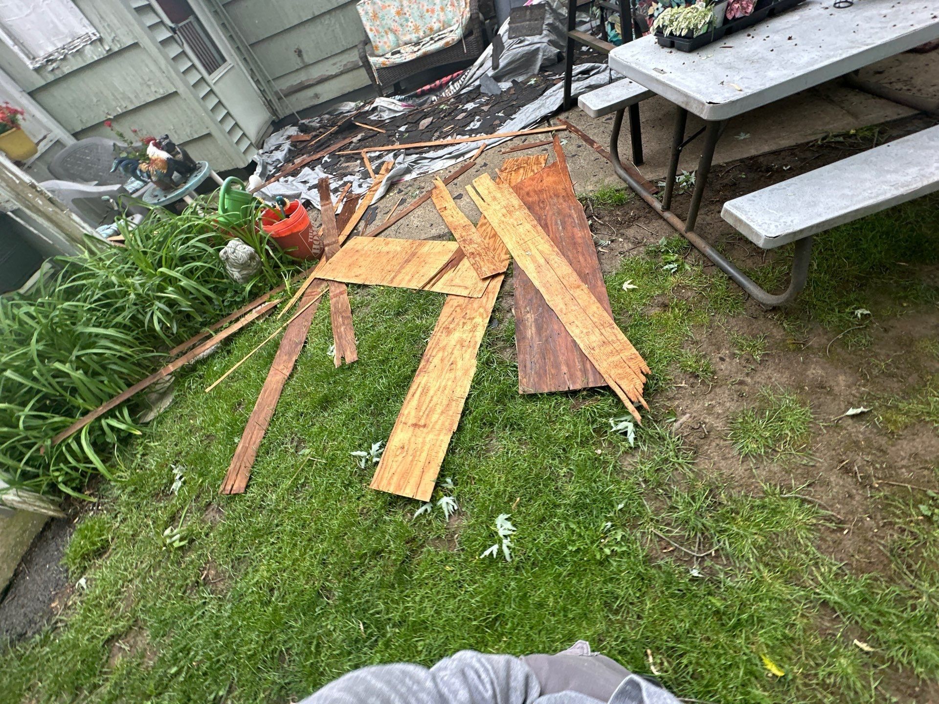 Board strips on the grass and picnic table