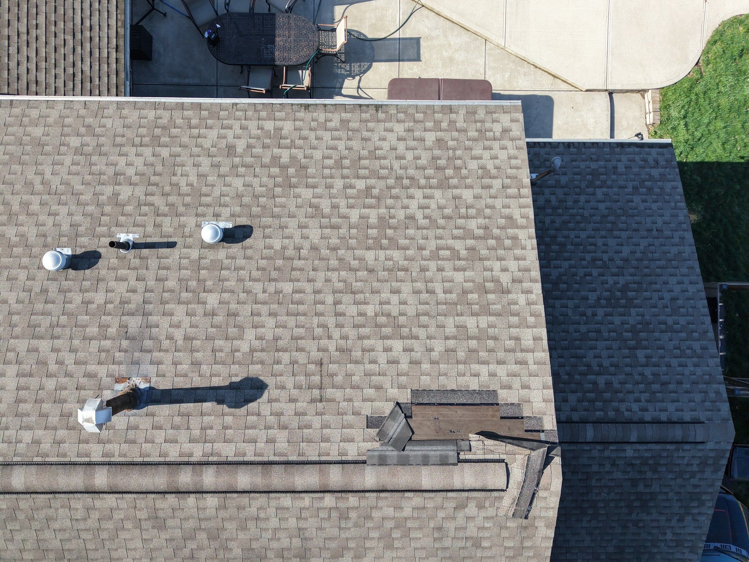 Wind-damaged shingles near the roof vents, seen from the drone, Kettering, Ohio.