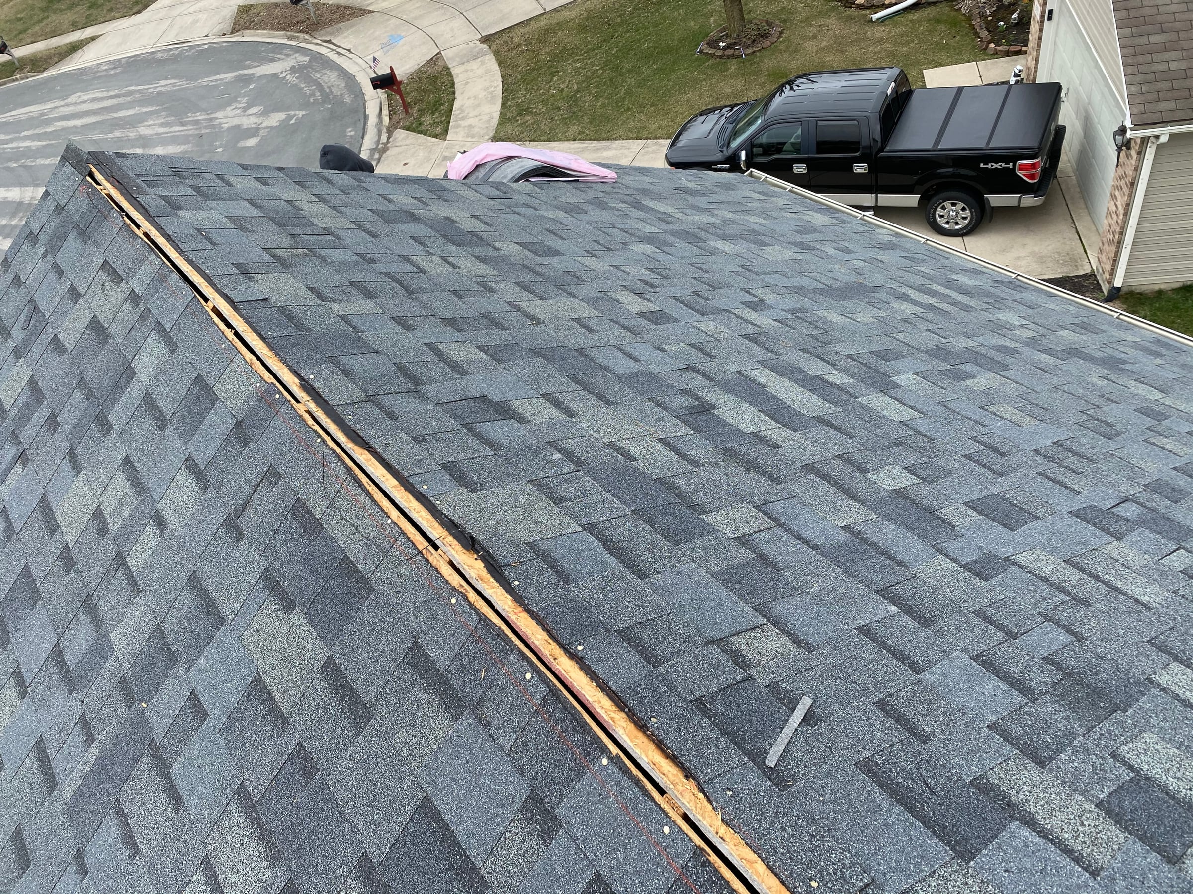 Shingles and bare timber at the slot