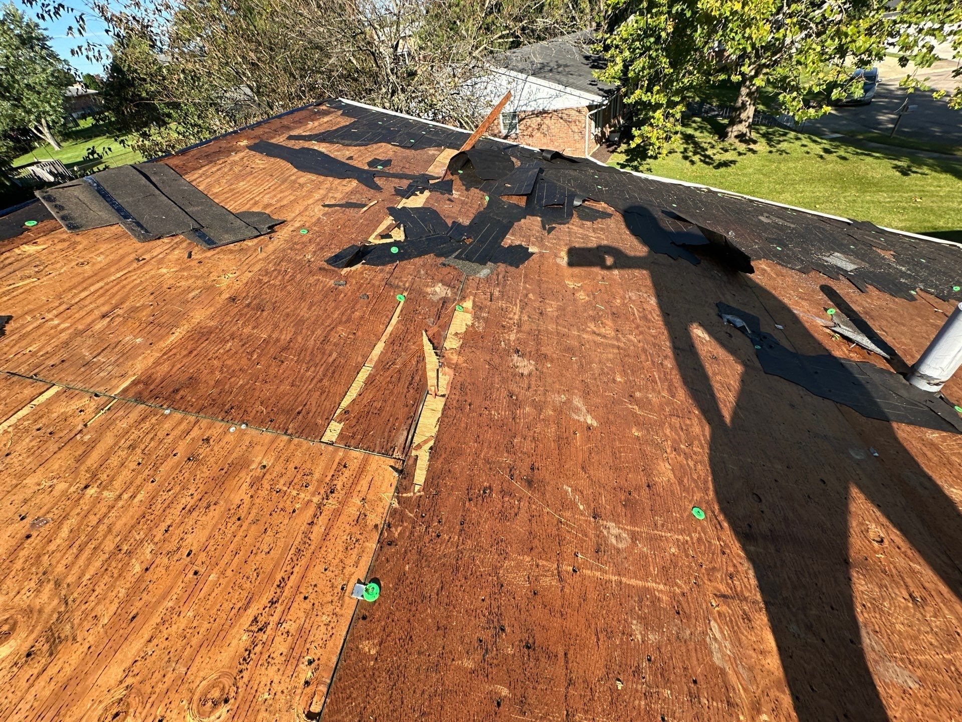 Split and patched deck boards across the slope, West Carrollton, Ohio.