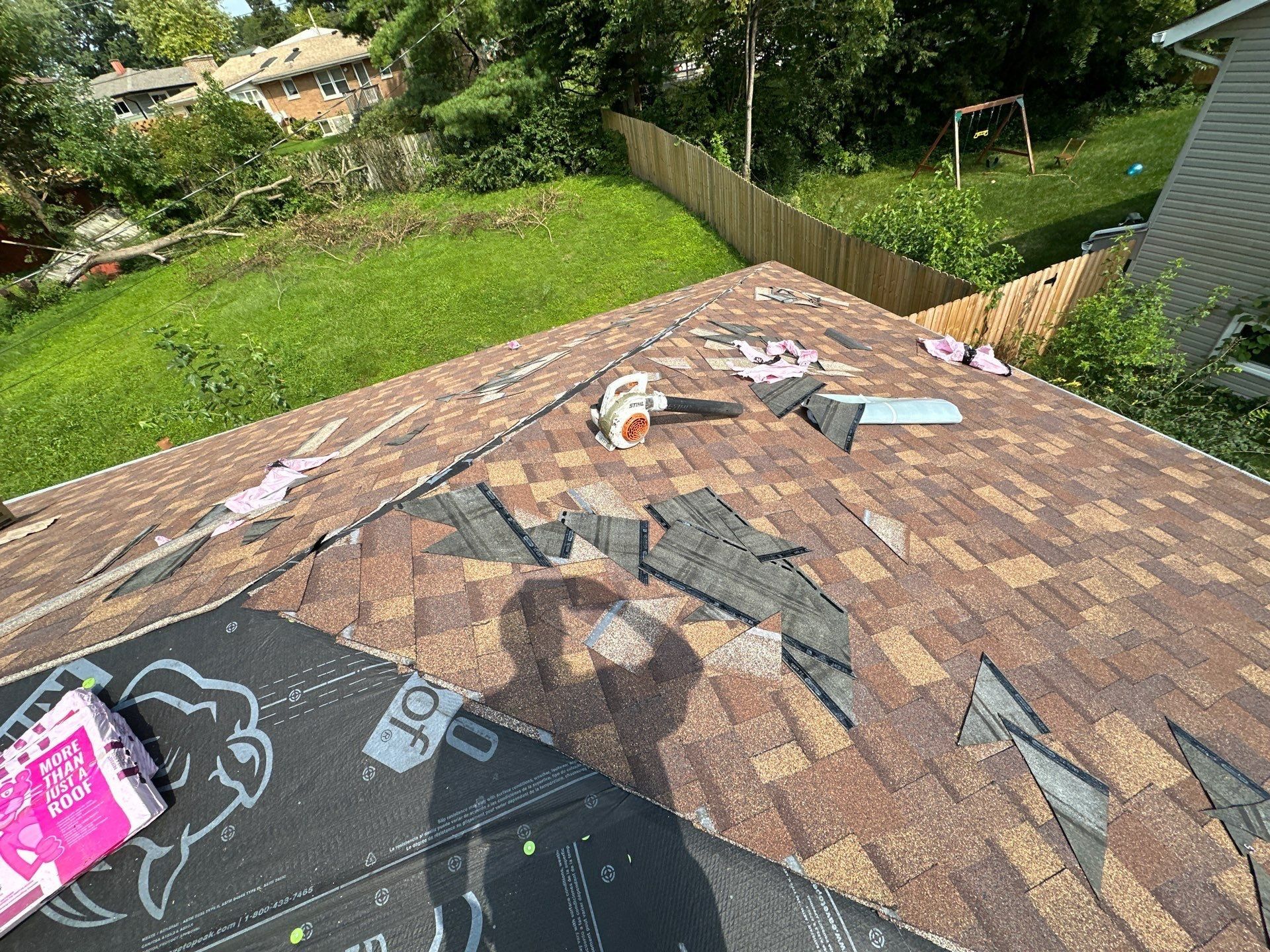 New shingles reaching the hip, with underlayment still showing at the end, Fairborn, Ohio.