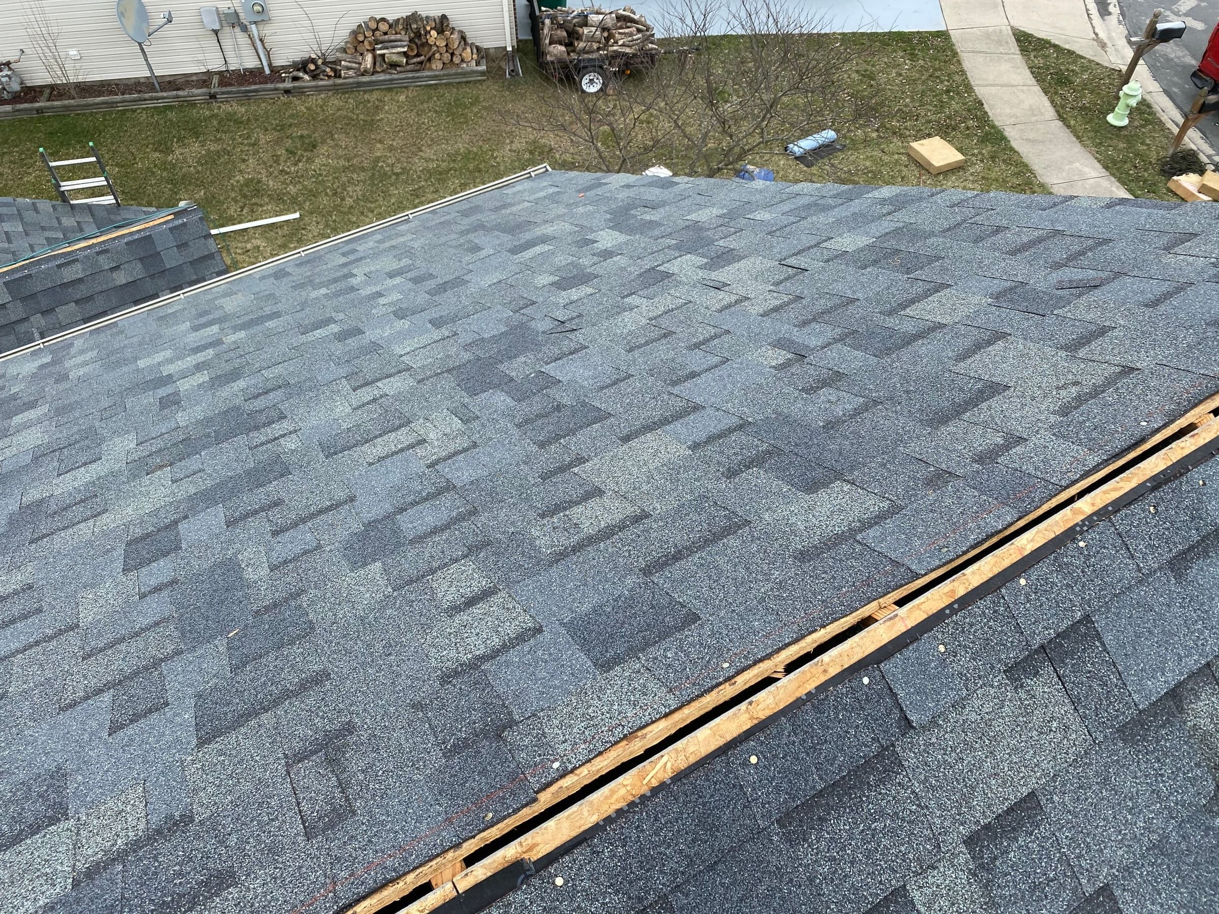 Shingled plane and open ridge slot