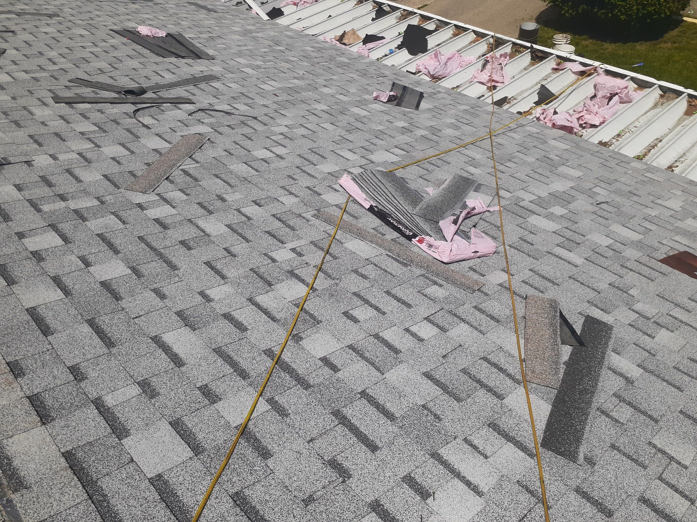 Chalk lines snapped across the new shingles, Huber Heights, Ohio.