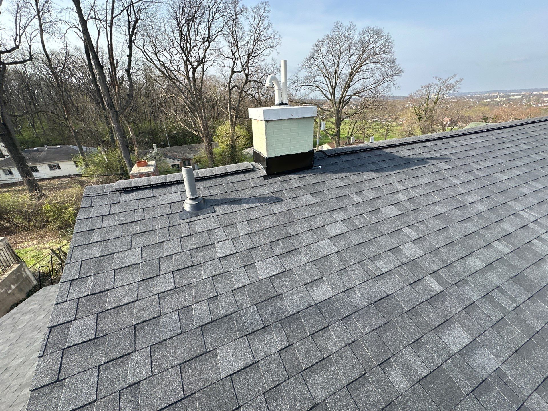 The finished roof with the faux chimney and a vent pipe, Dayton, Ohio.
