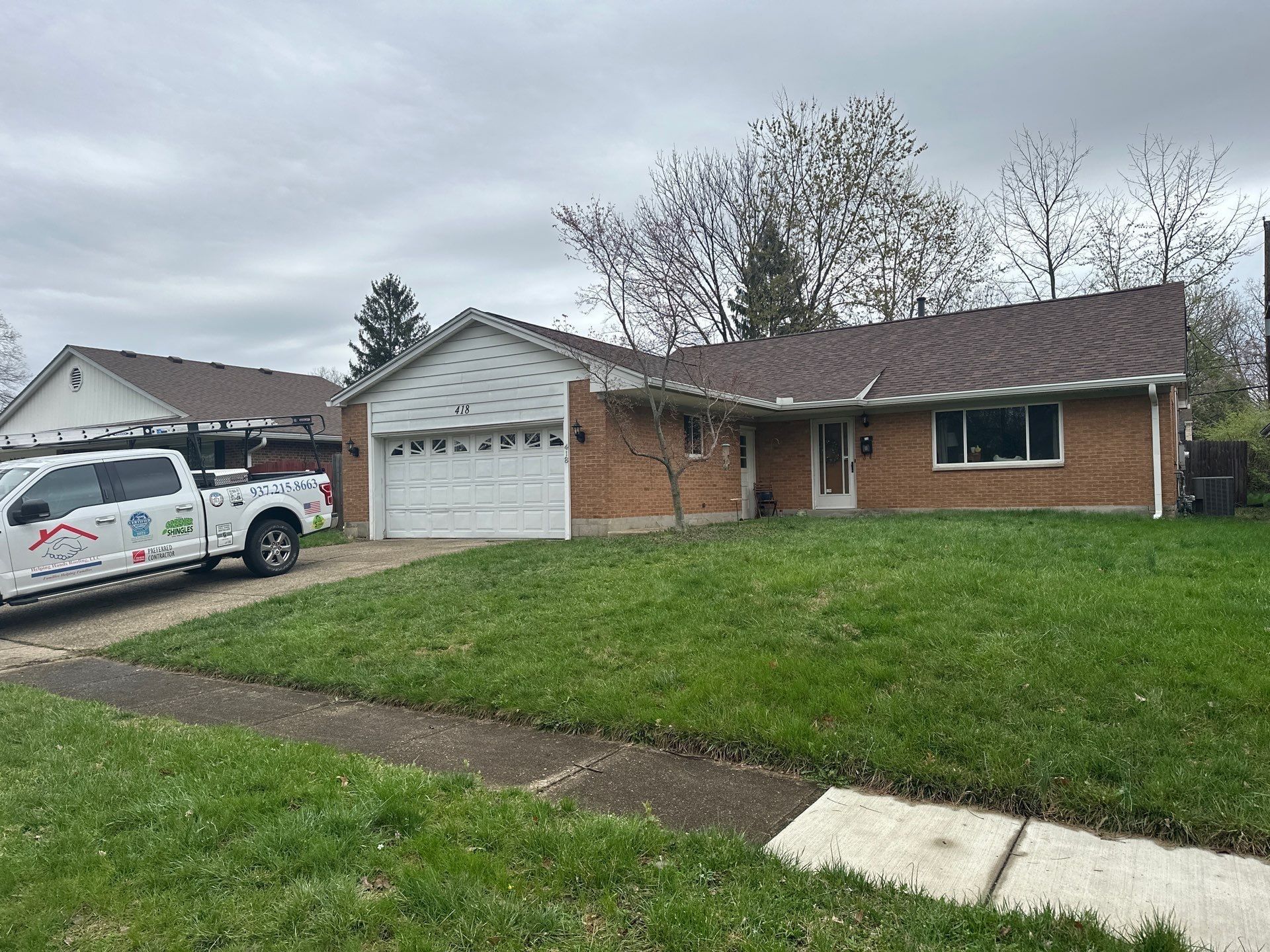 Brick ranch front from the driveway