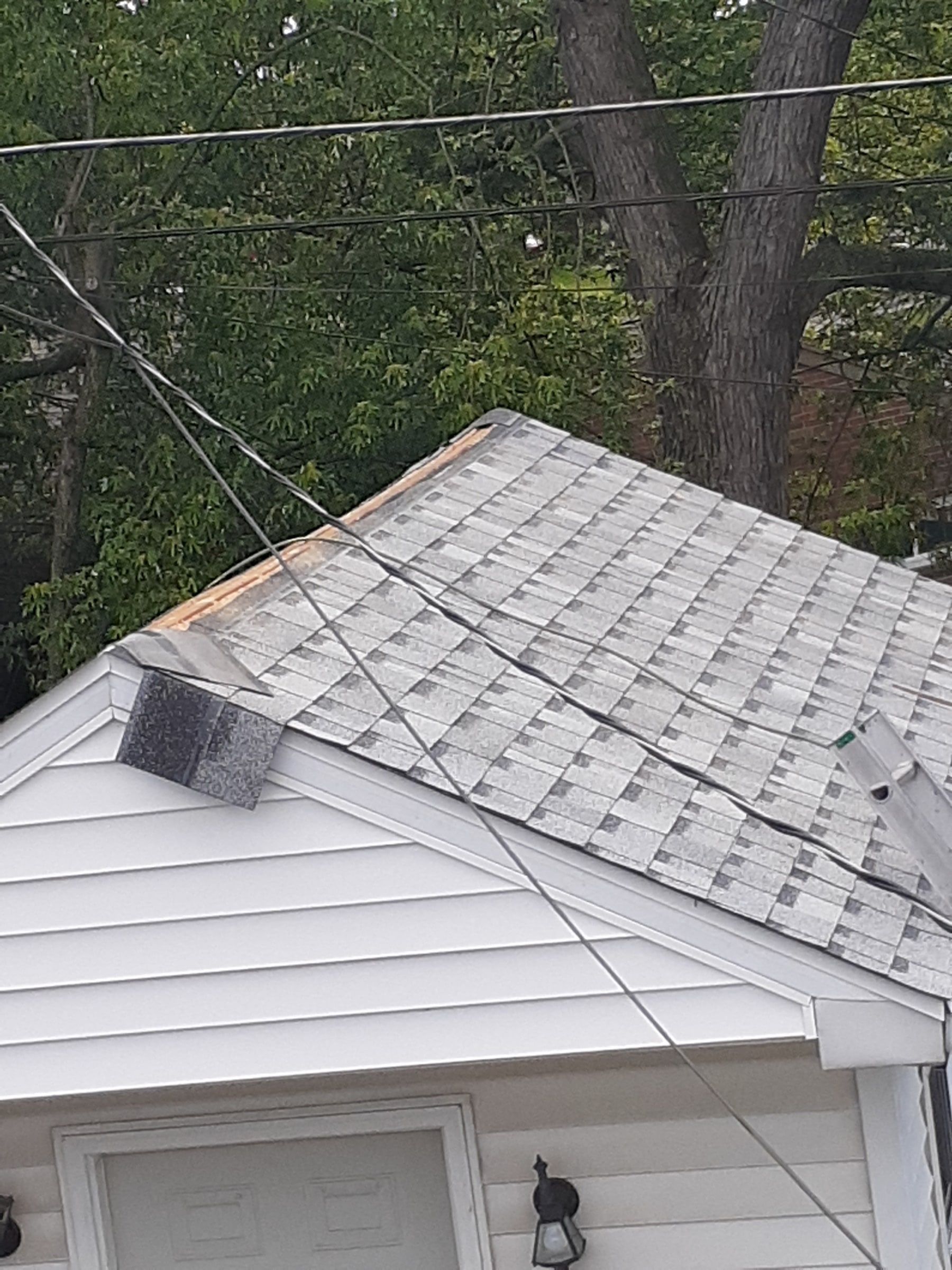 The garage roof nearly finished, seen from the yard, Huber Heights, Ohio.
