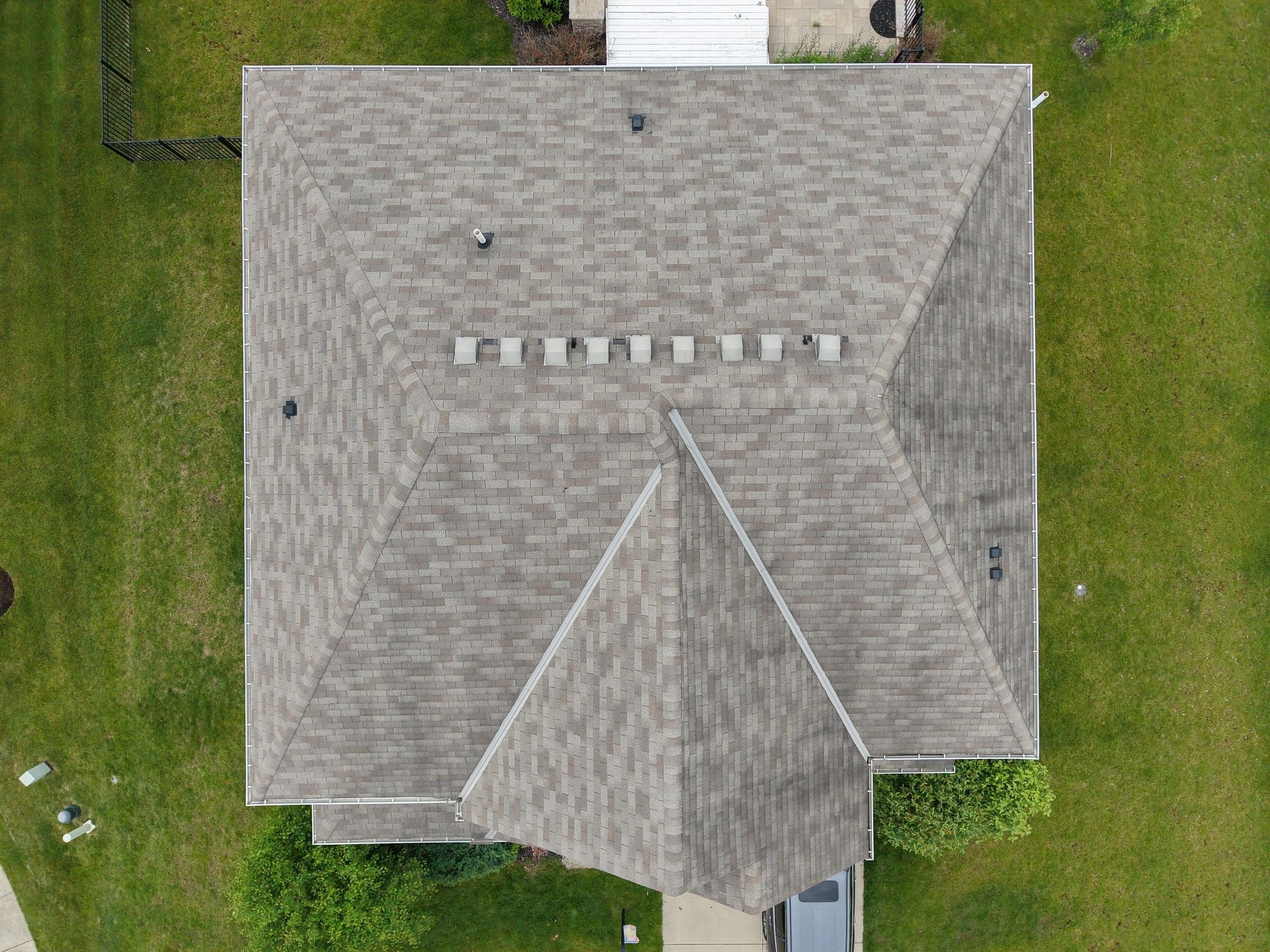 Drone photo of the roof from straight above, with the row of box vents along the ridge, Xenia, Ohio.