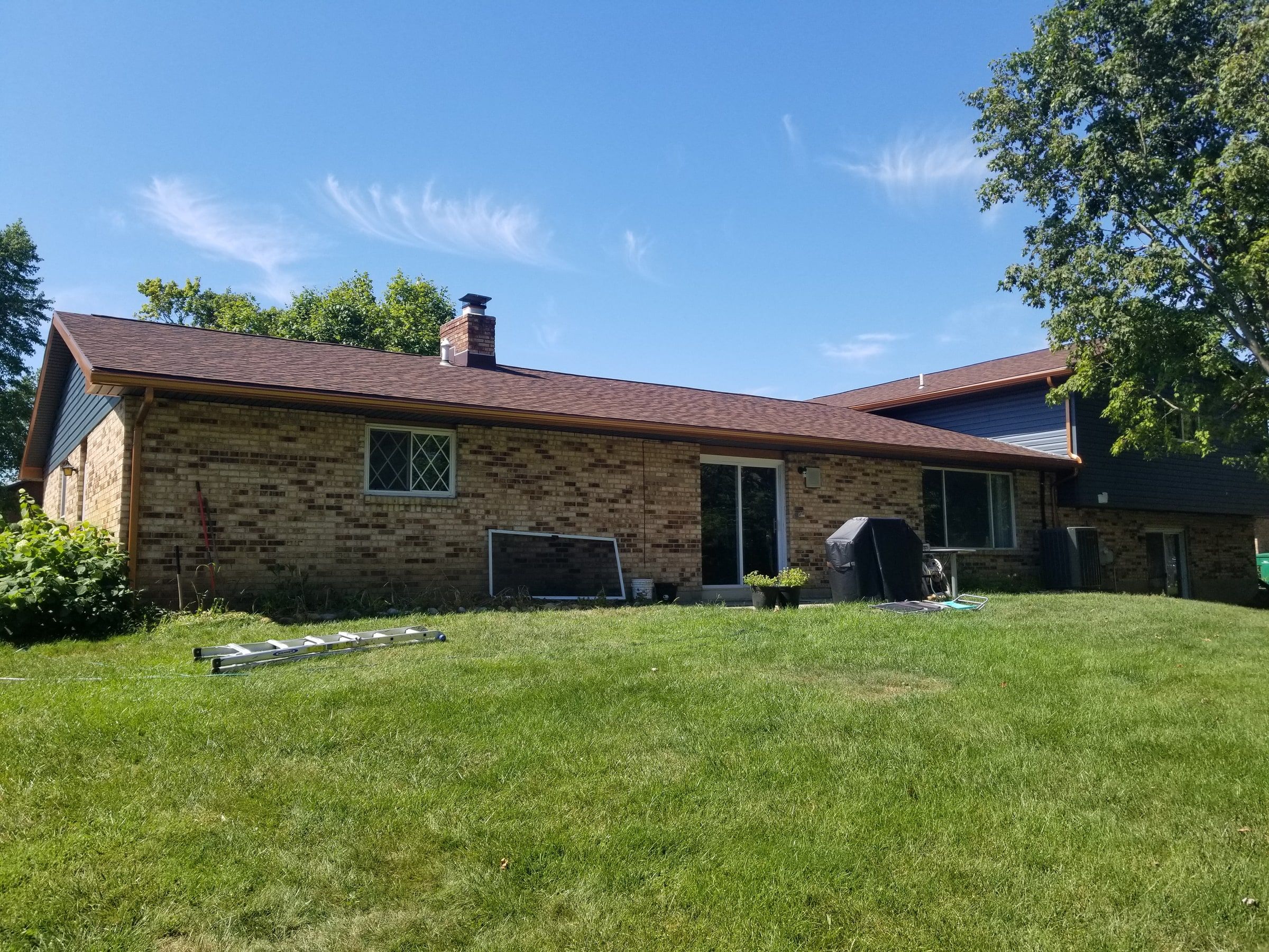 The back of the house with copper-colored gutters along the roof, Beavercreek, Ohio.