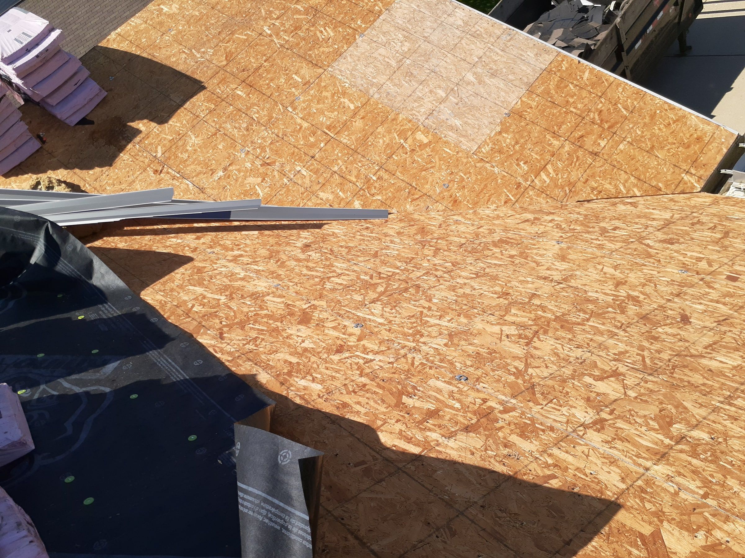 New sheathing and stacked edge metal
