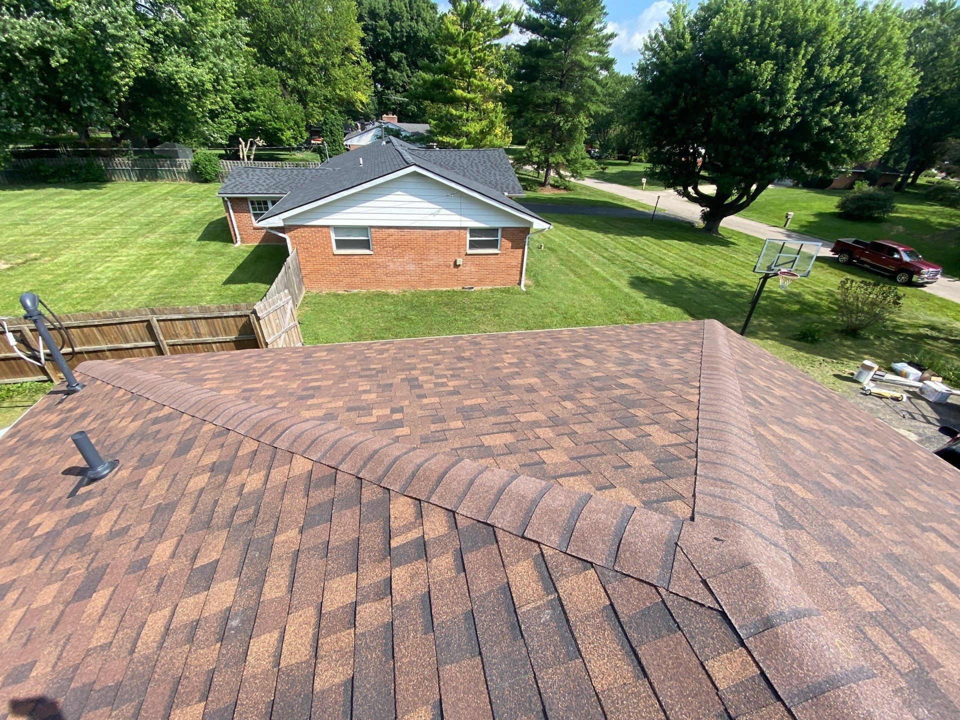 Completed hip roof overlooking the back yard and neighboring homes, Beavercreek, Ohio.