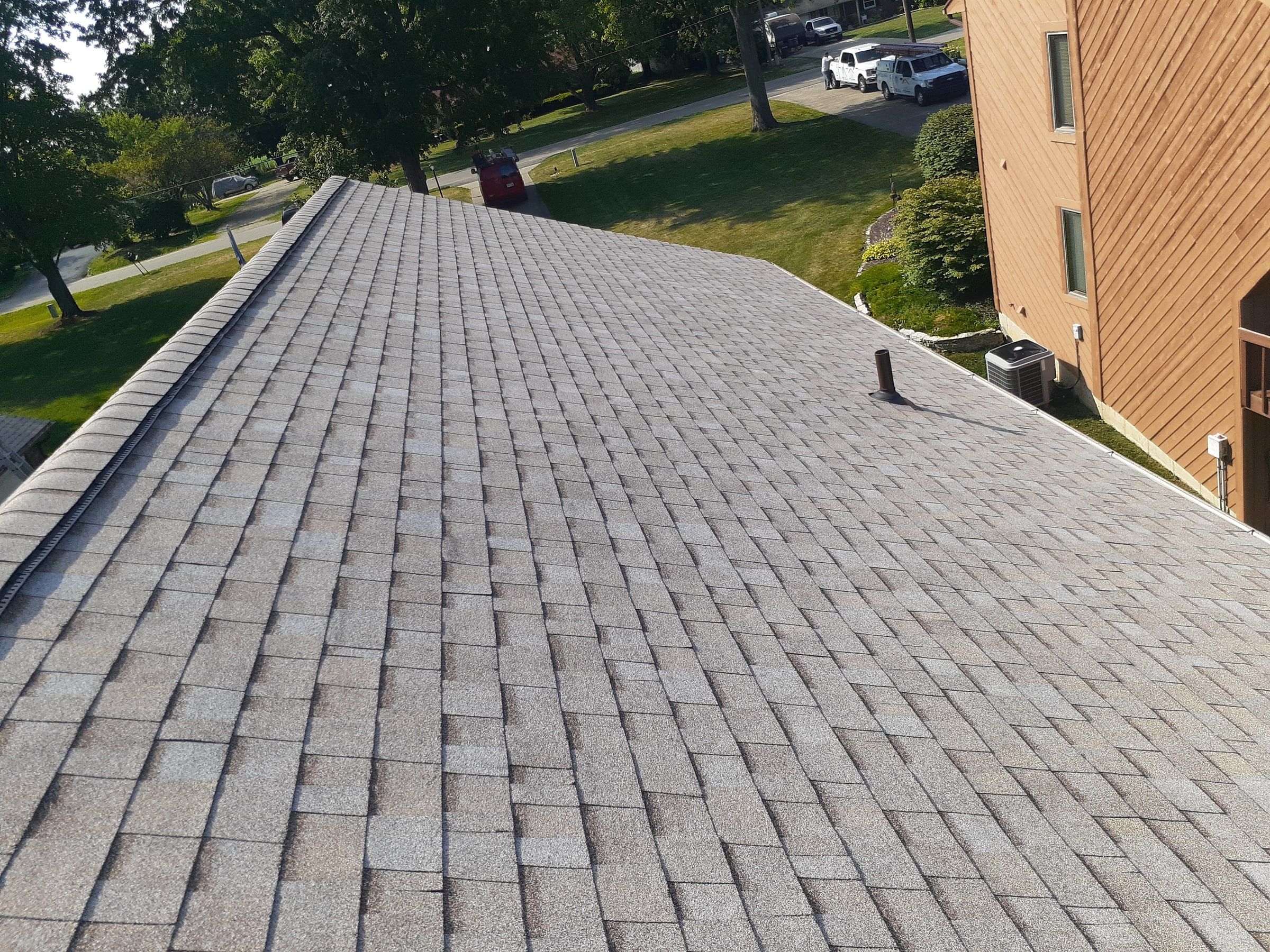 Finished side slope with a pipe vent near the neighboring house, Jamestown, Ohio.
