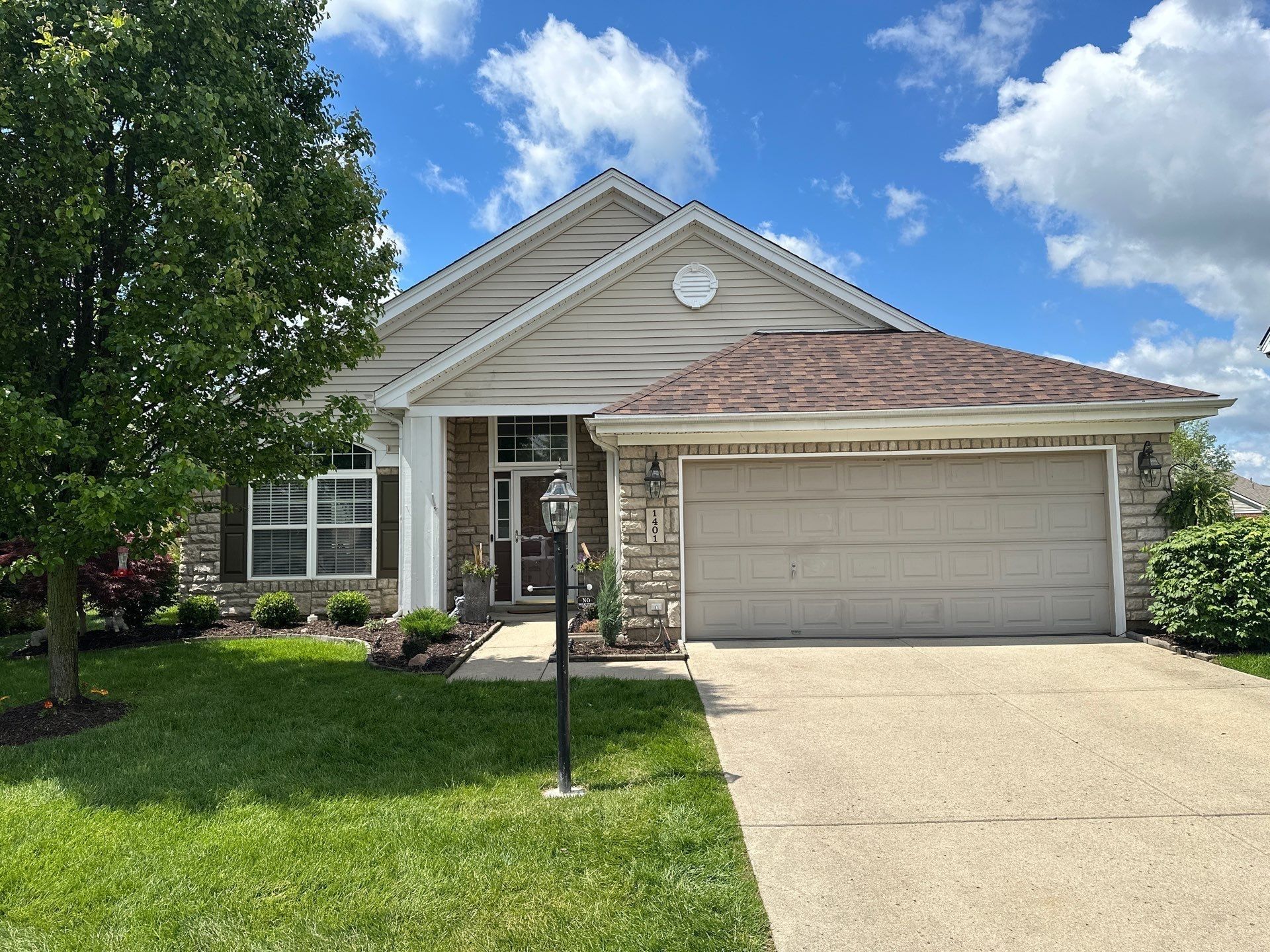 Stone and siding front elevation