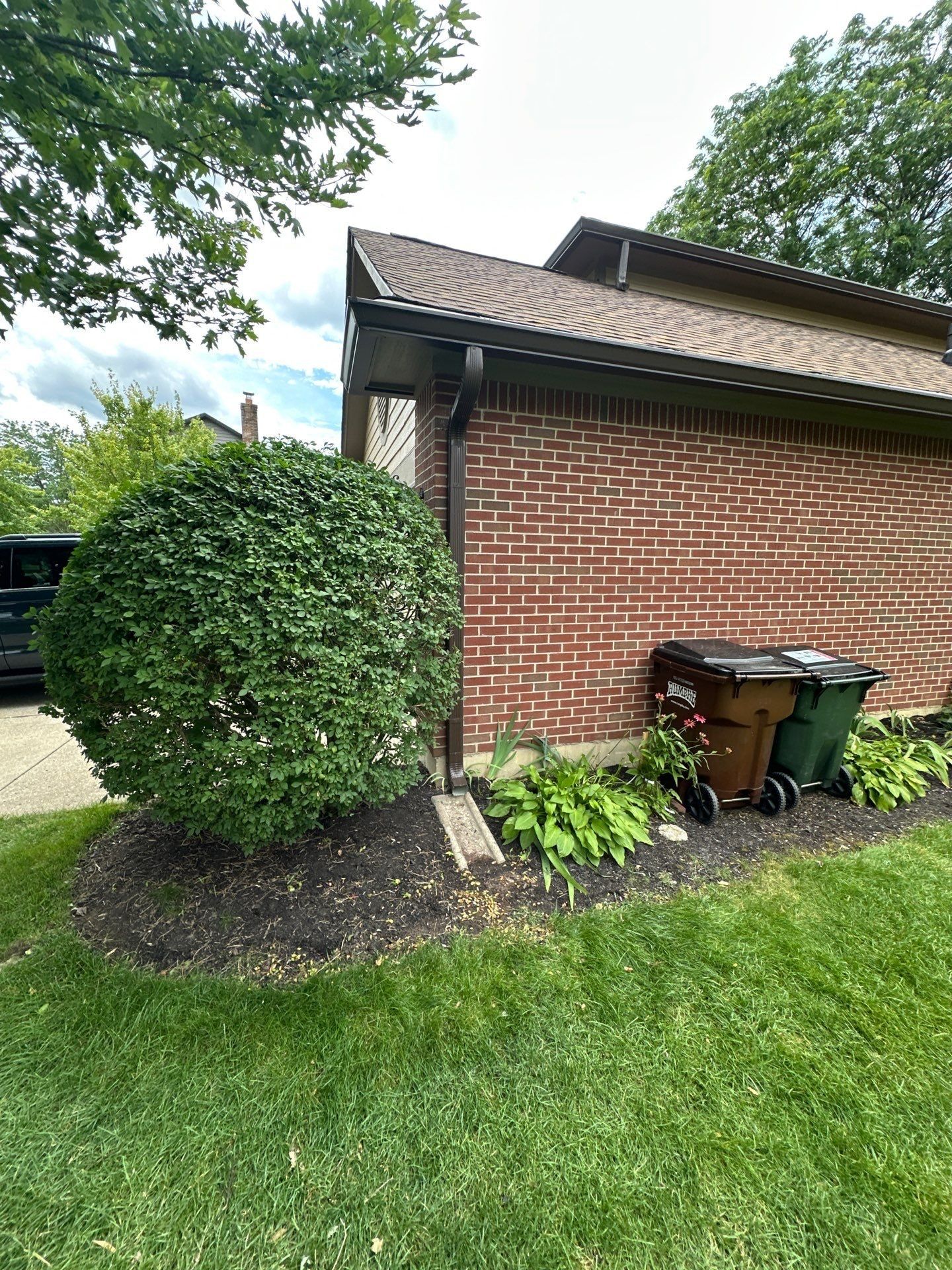 New seamless gutter and downspout at the side of the garage, Beavercreek, Ohio.