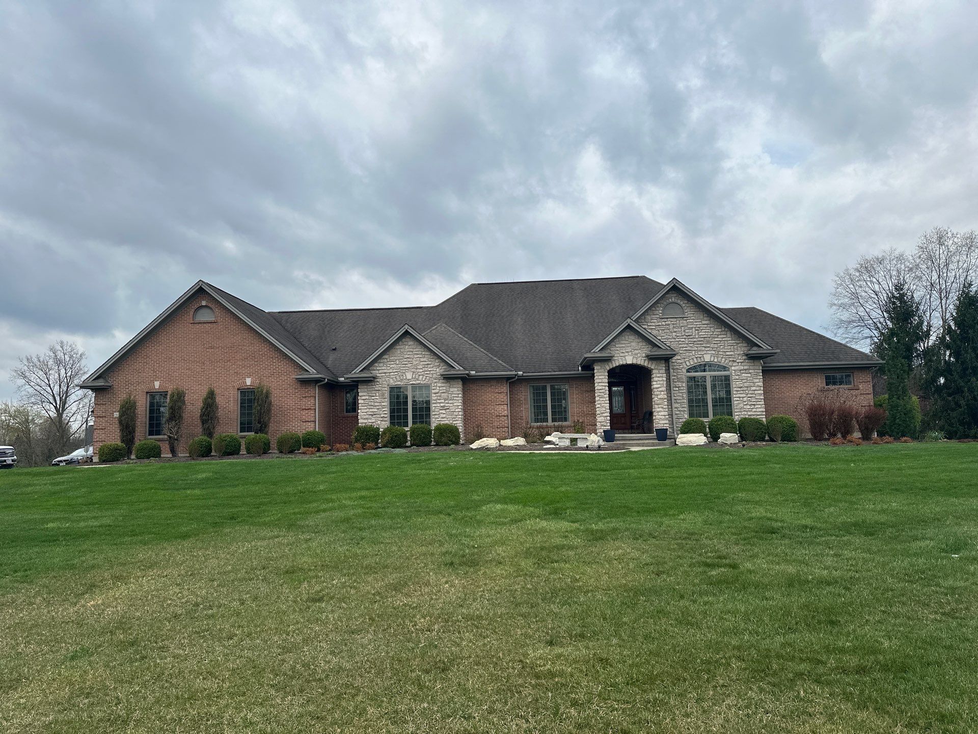 Long front elevation under overcast sky