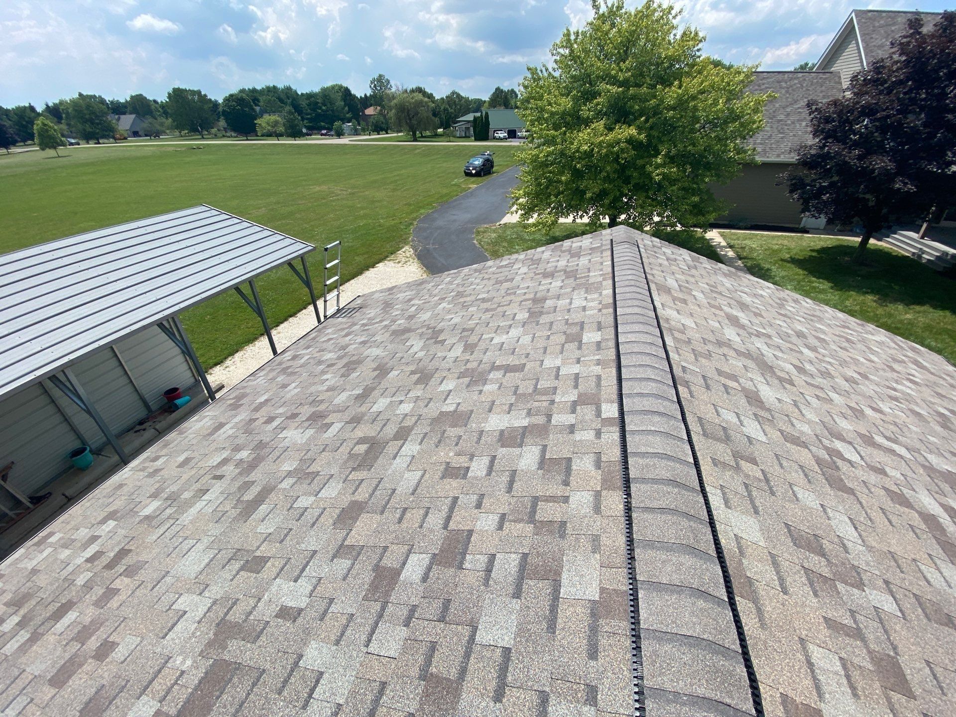 Ridge vent across the finished detached garage roof, Yellow Springs, Ohio.
