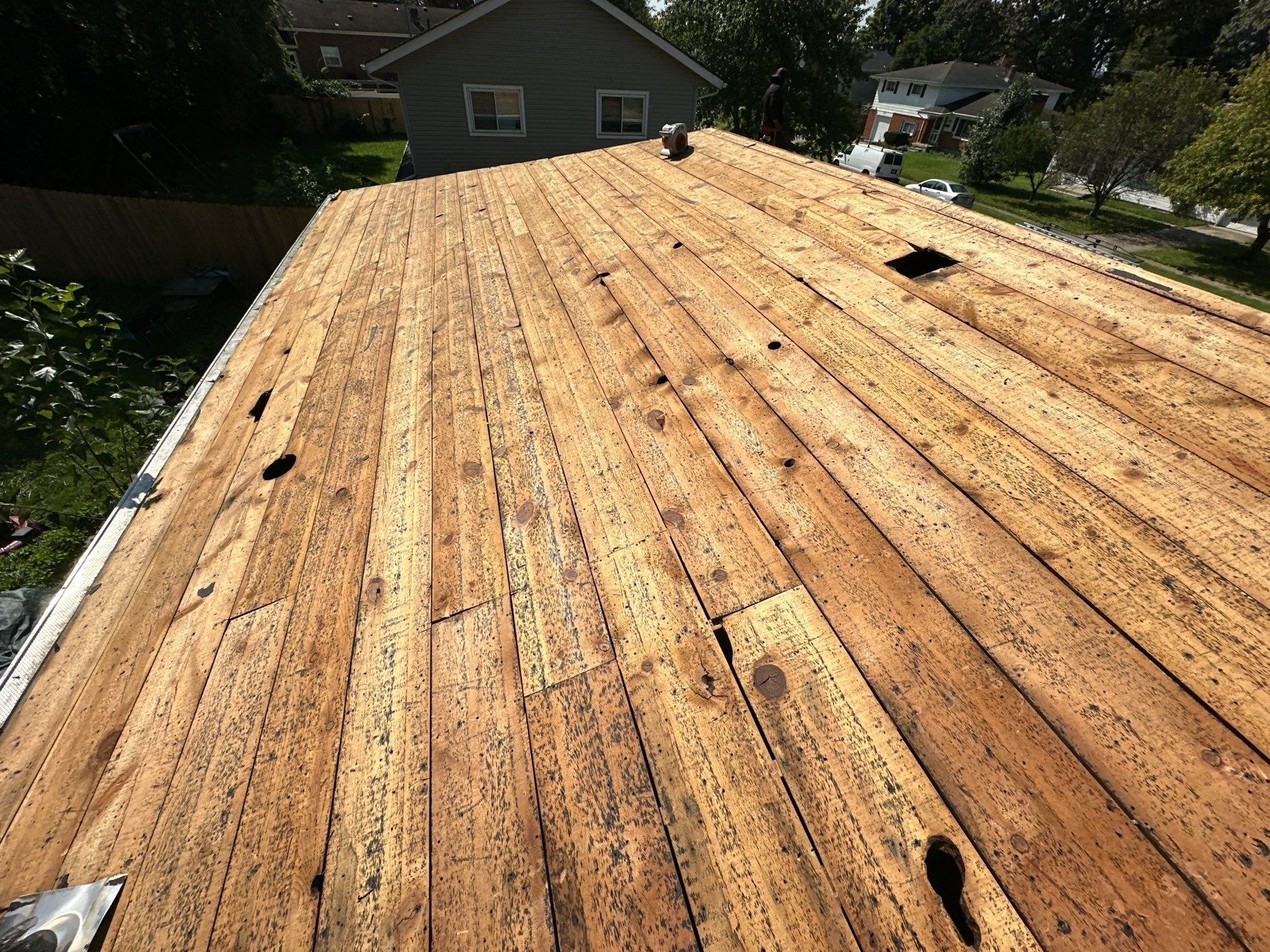 The full board deck cleaned to bare wood, looking along the roof, Fairborn, Ohio.