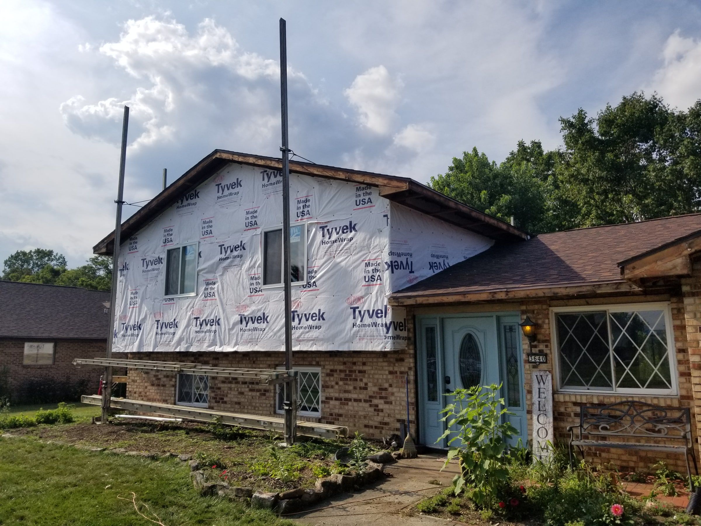 House wrap over the fanfold on the front of the upper story, Beavercreek, Ohio.