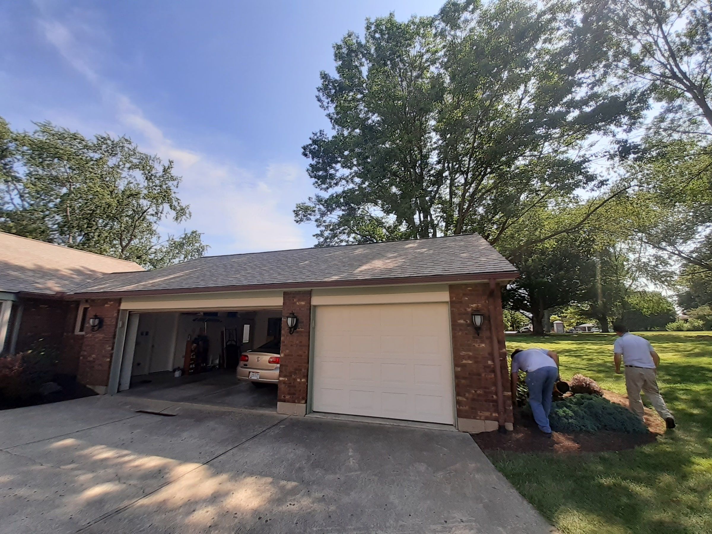 Garage end of the house with the finished roof from the driveway, Jamestown, Ohio.