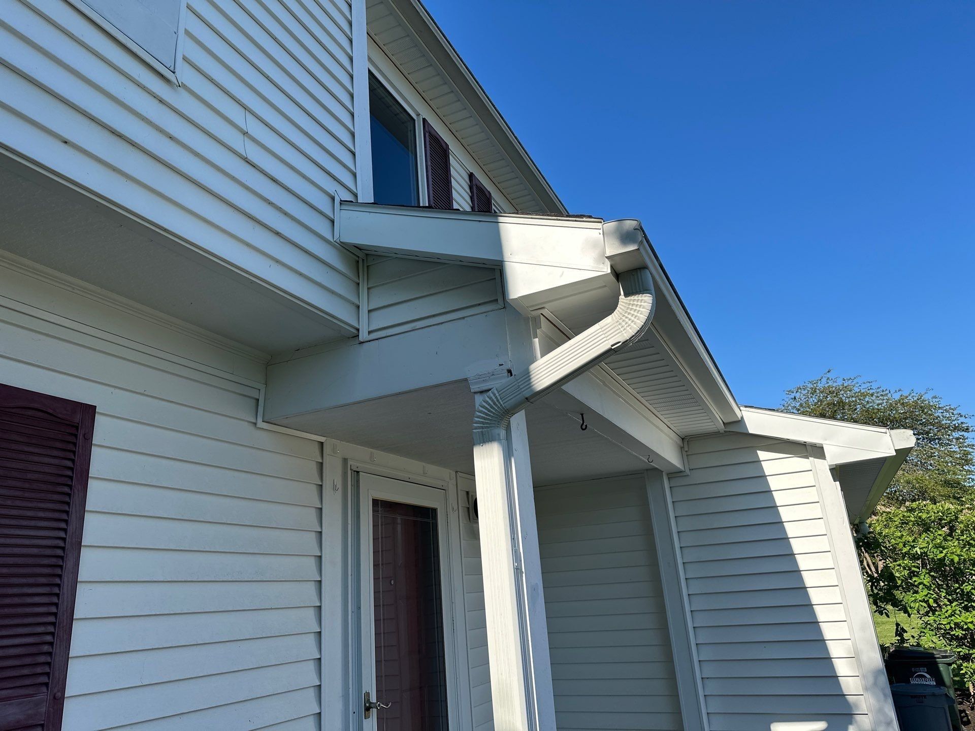 Porch roof corner and downspout