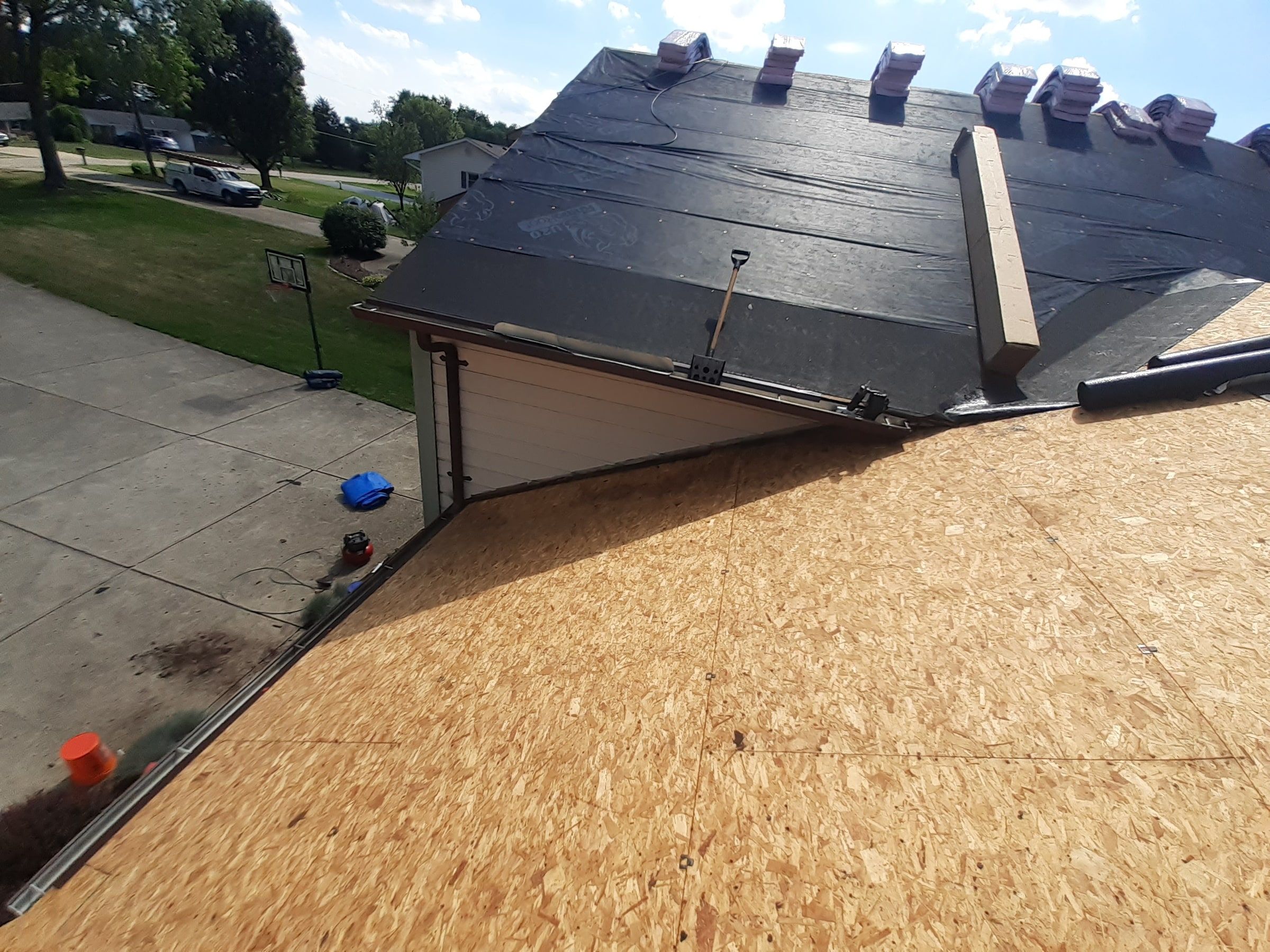 Upper roof in underlayment above the lower slope still to be covered, Jamestown, Ohio.