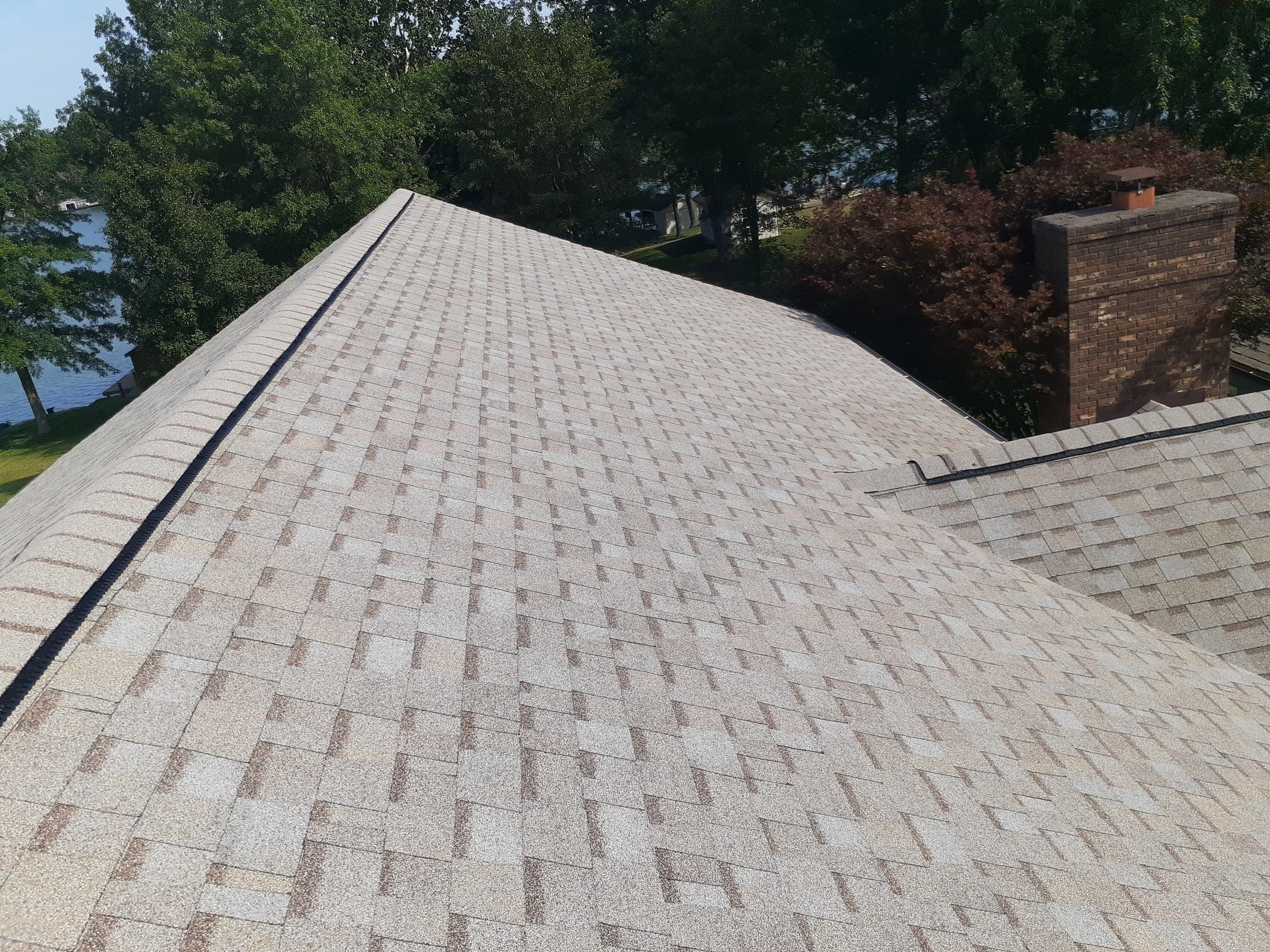 Finished slope running toward the chimney beside the trees, Jamestown, Ohio.