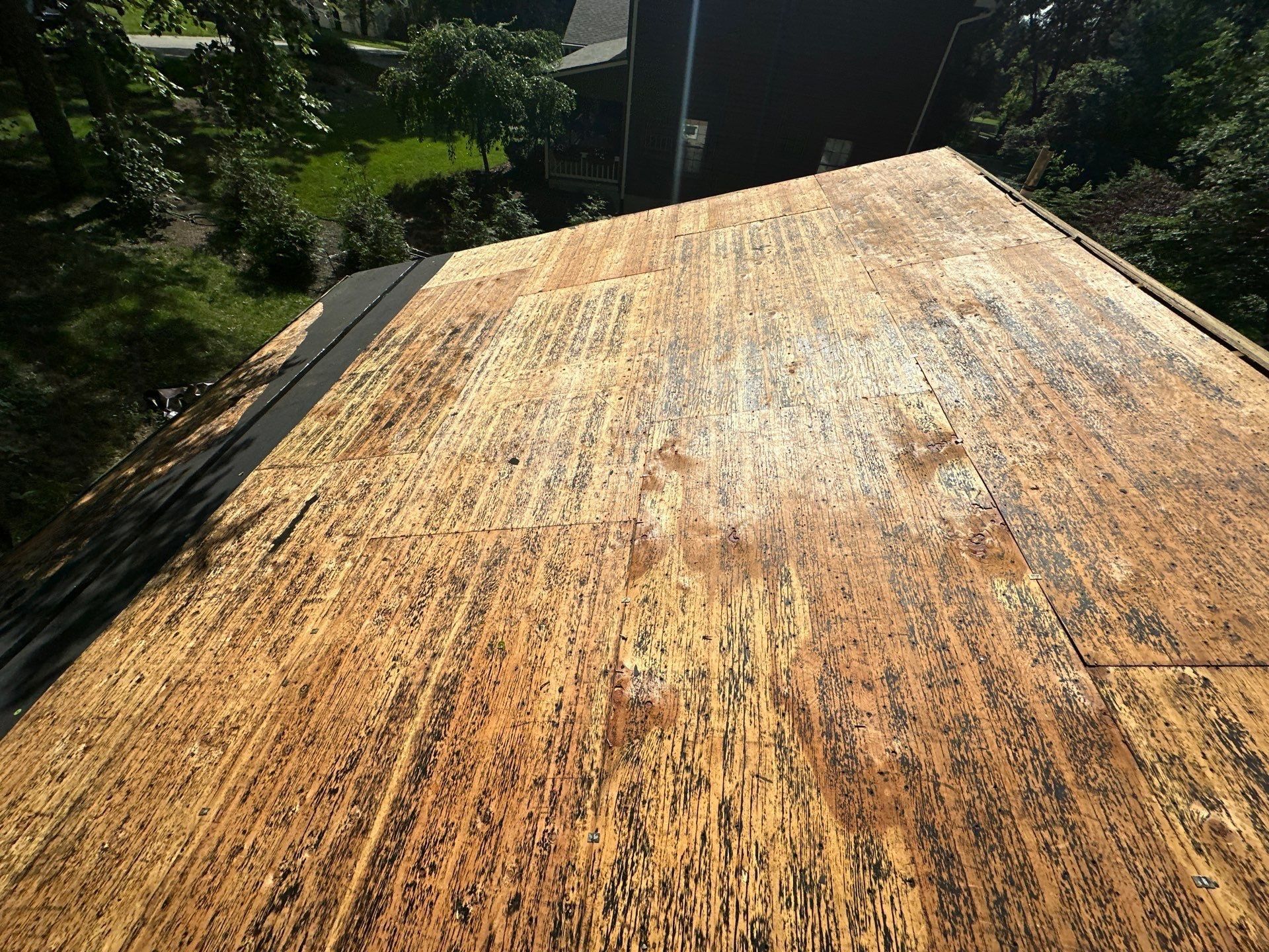 The old deck boards swept clean down the slope, Beavercreek, Ohio.