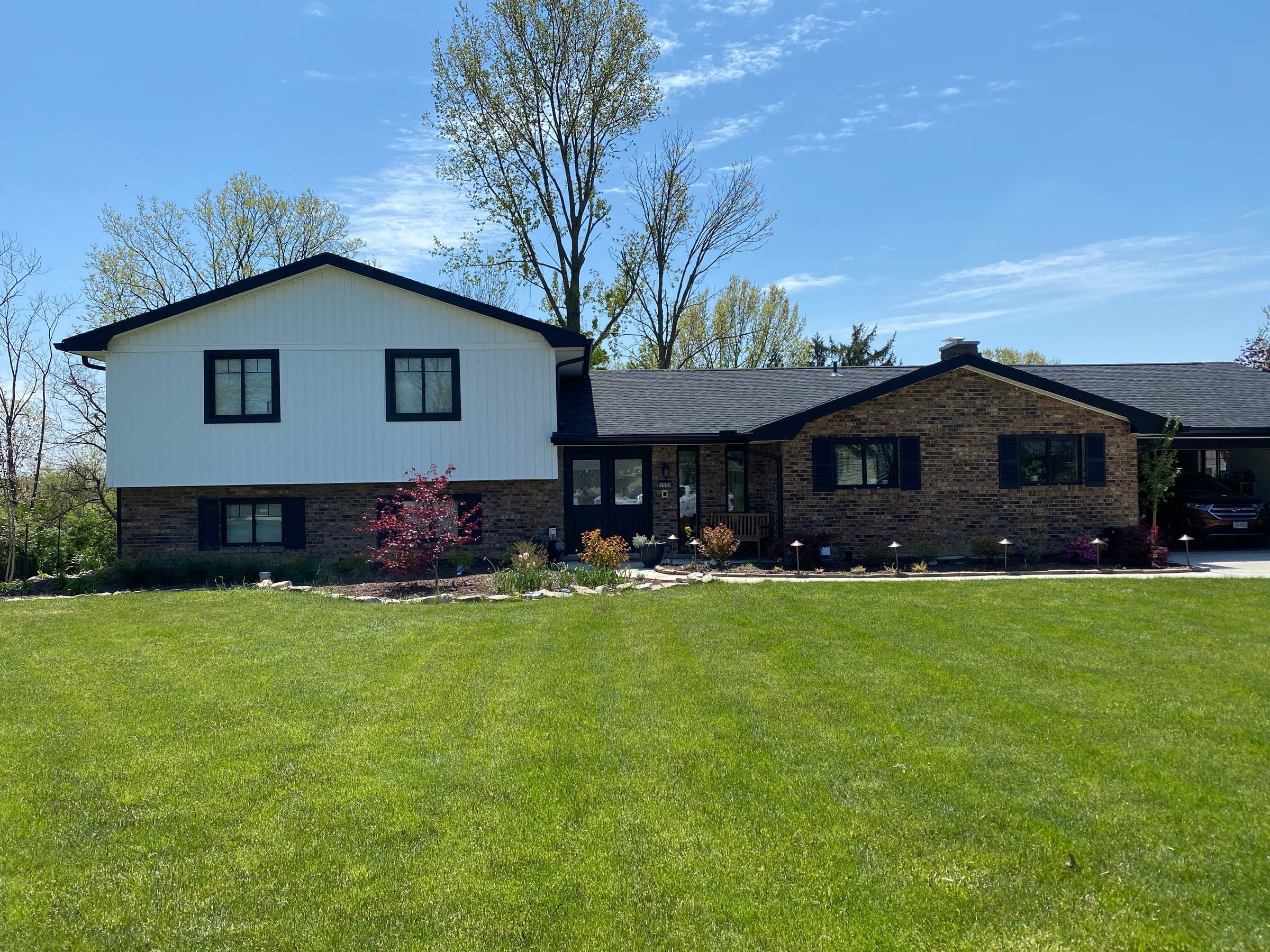 The whole house from the front lawn in its new siding, Beavercreek, Ohio.