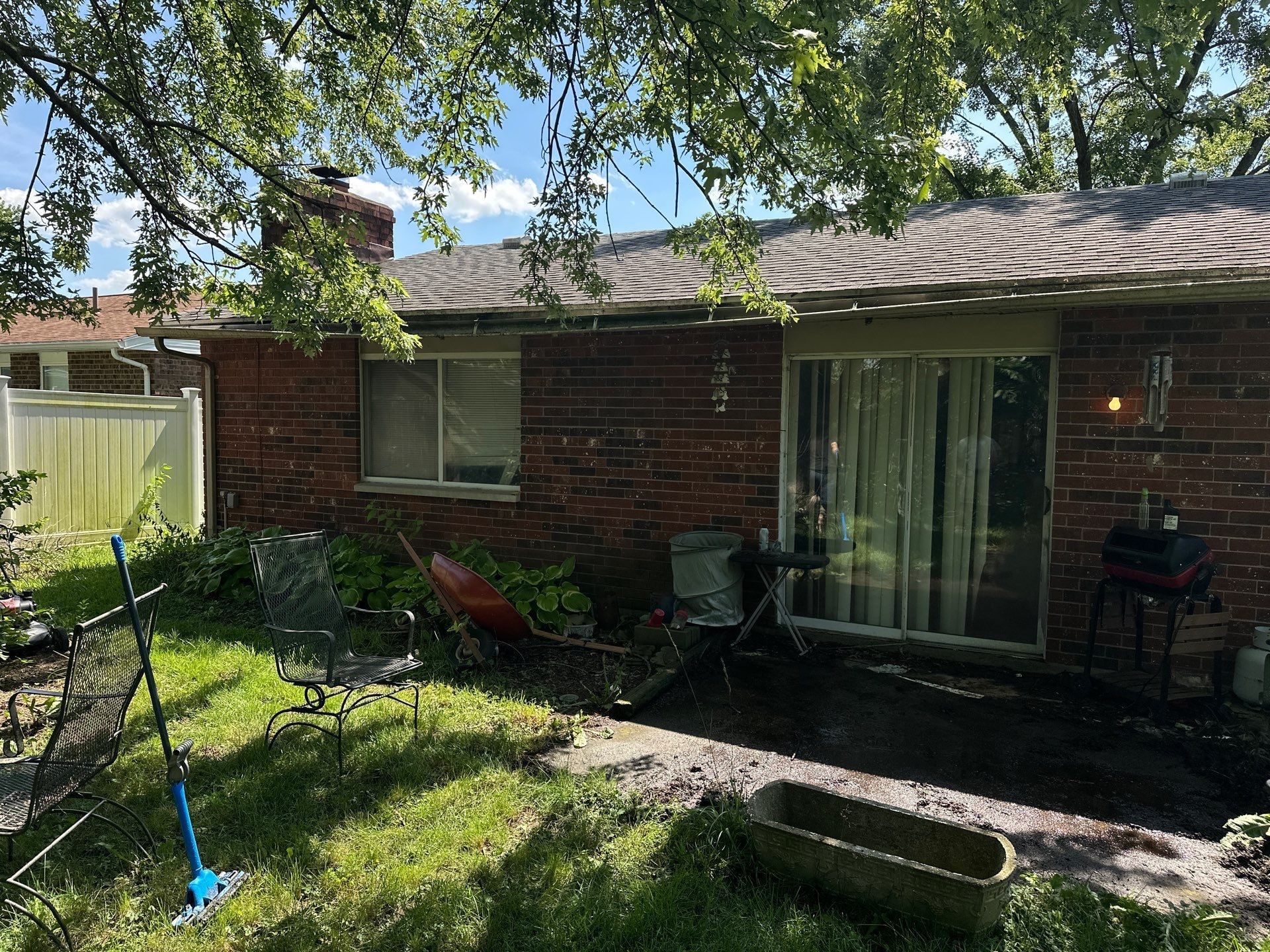 The back of the brick ranch before the gutter work, Xenia, Ohio.